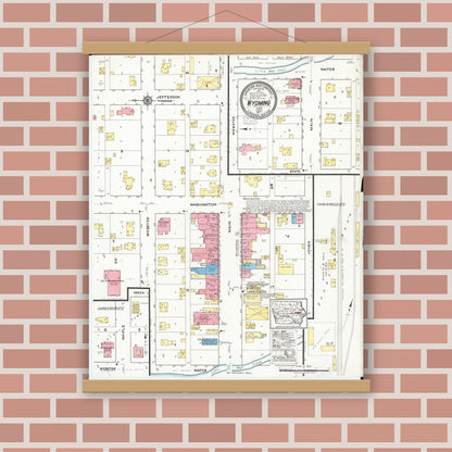 Old map wall art mockup — magnetic wood frame on brick wall — Sanborn Fire Insurance Map from Wyoming, Jones County, Iowa (1917), Sheet #0001