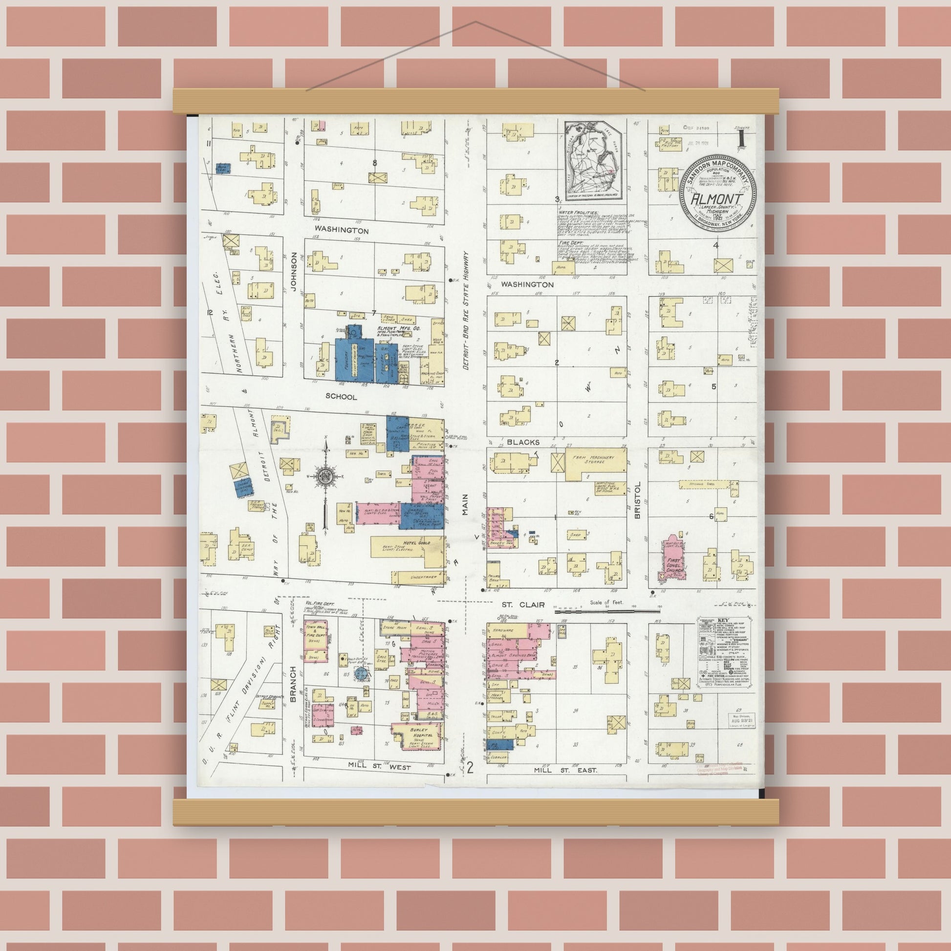 Old map wall art mockup — magnetic wood frame on brick wall — Sanborn Fire Insurance Map from Almont, Lapeer County, Michigan (1921) - Complete Map Set
