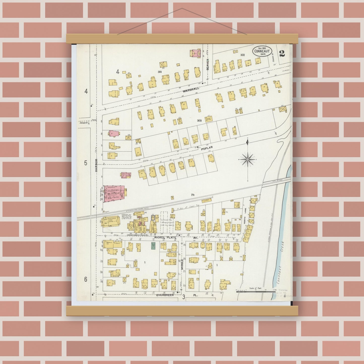 Old map wall art mockup — magnetic wood frame on brick wall — Sanborn Fire Insurance Map from Conneaut, Ashtabula County, Ohio (1902), Sheet #0002