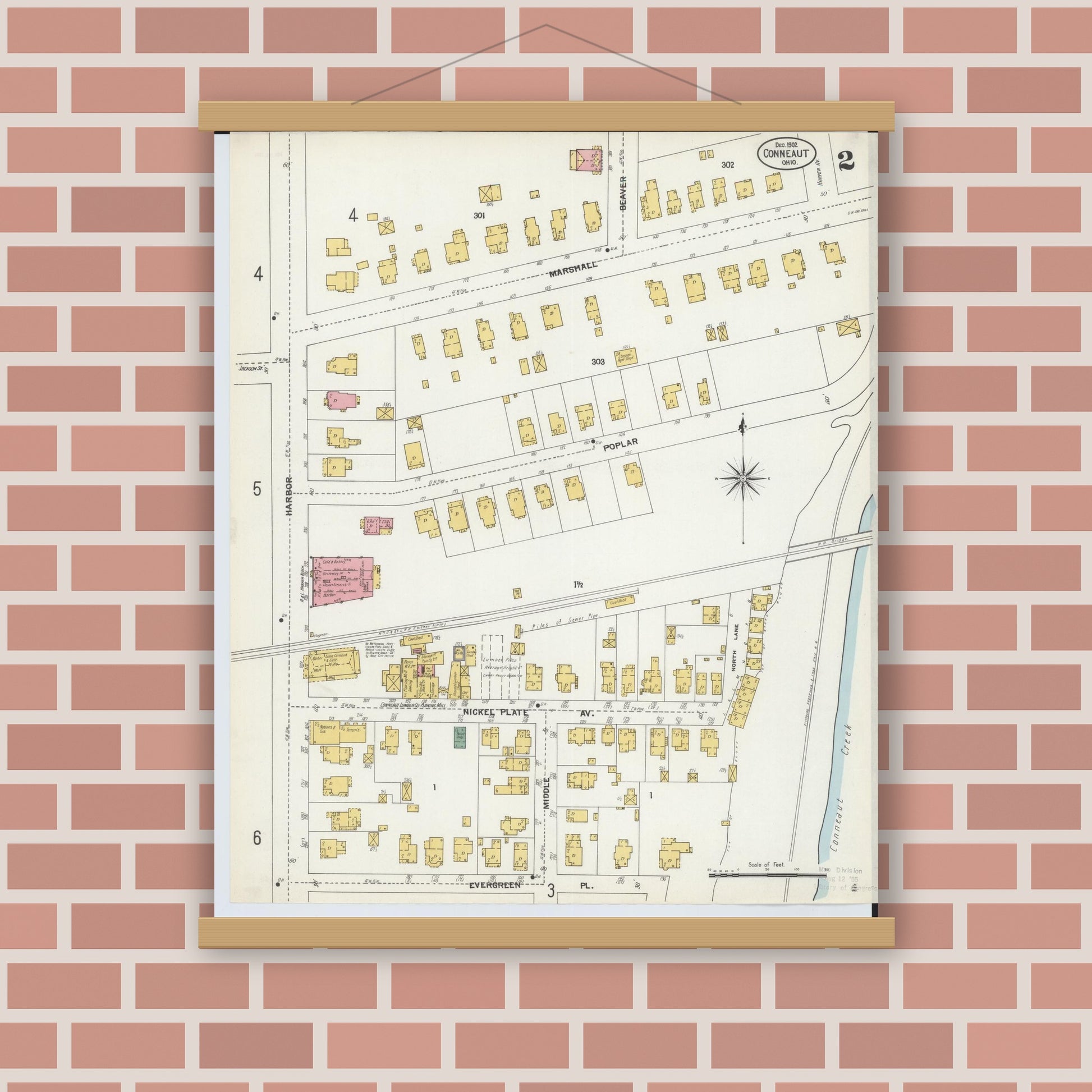 Old map wall art mockup — magnetic wood frame on brick wall — Sanborn Fire Insurance Map from Conneaut, Ashtabula County, Ohio (1902), Sheet #0002