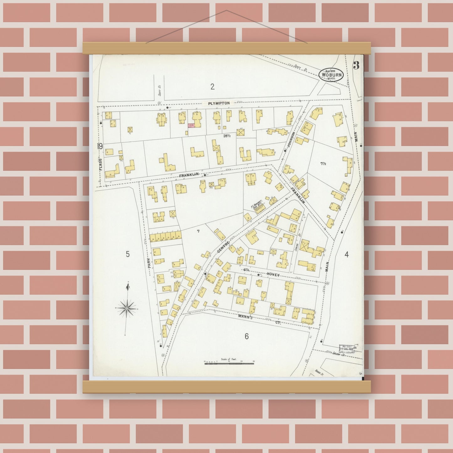 Old map wall art mockup — magnetic wood frame on brick wall — Sanborn Fire Insurance Map from Woburn, Middlesex County, Massachusetts (1899), Sheet #0003