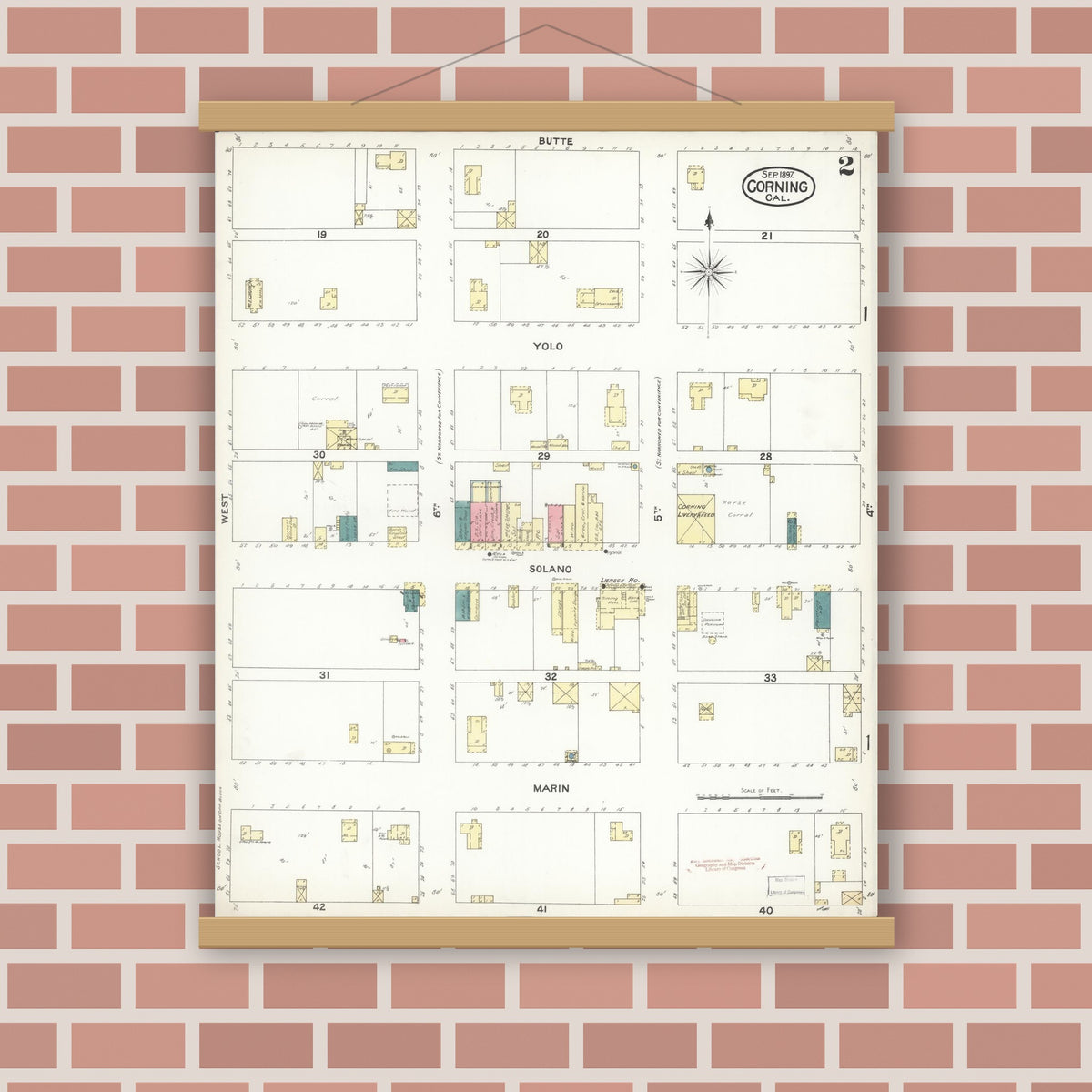 Old map wall art mockup — magnetic wood frame on brick wall — Sanborn Fire Insurance Map from Corning, Tehama County, California (1897), Sheet #0002