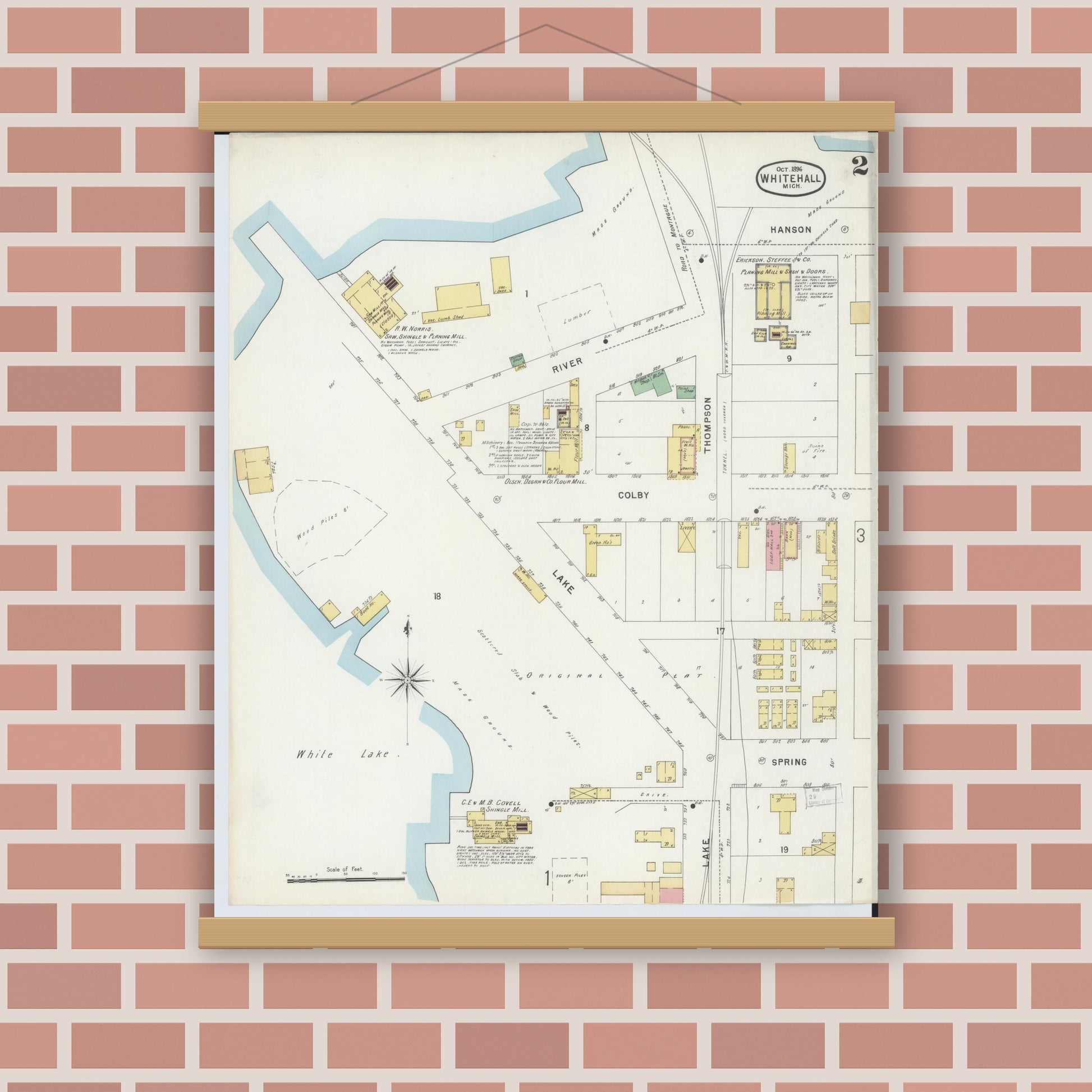 Old map wall art mockup — magnetic wood frame on brick wall — Sanborn Fire Insurance Map from Whitehall, Muskegon County, Michigan (1896), Sheet #0002