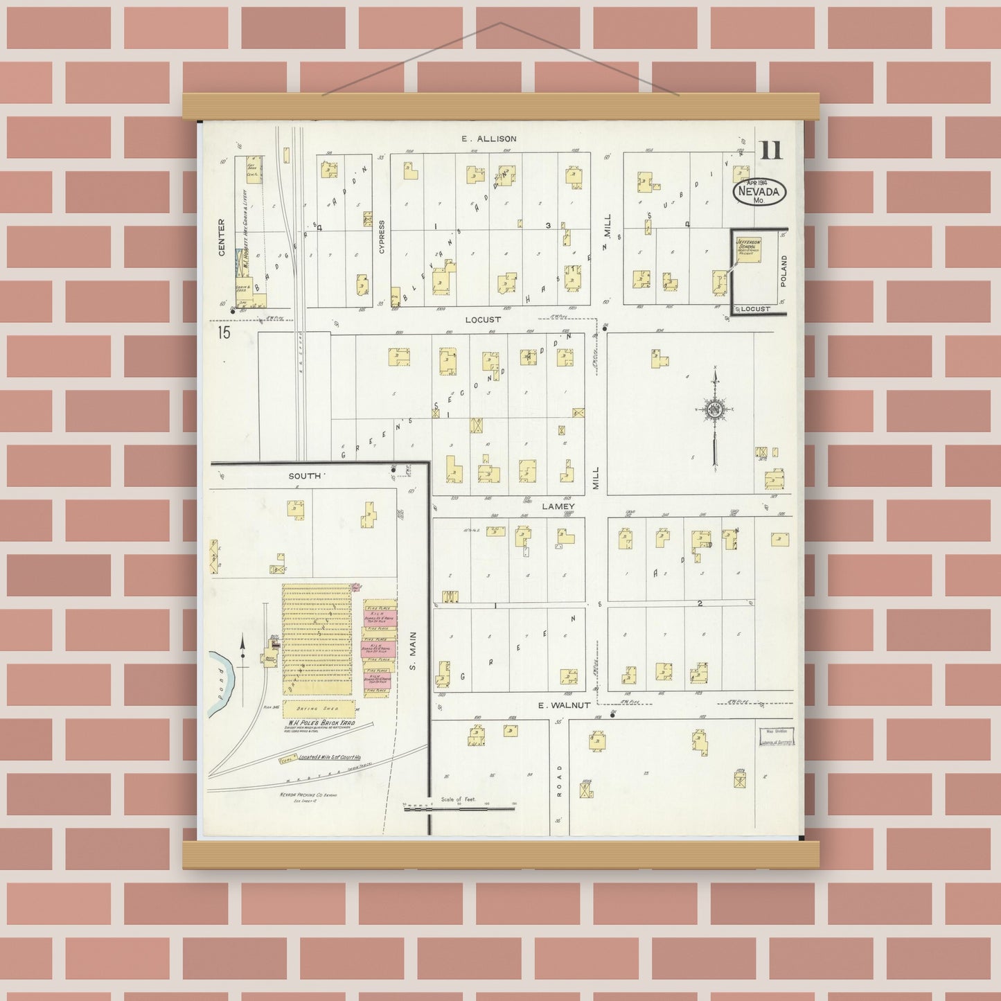 Old map wall art mockup — magnetic wood frame on brick wall — Sanborn Fire Insurance Map from Nevada, Vernon County, Missouri (1914), Sheet #0011