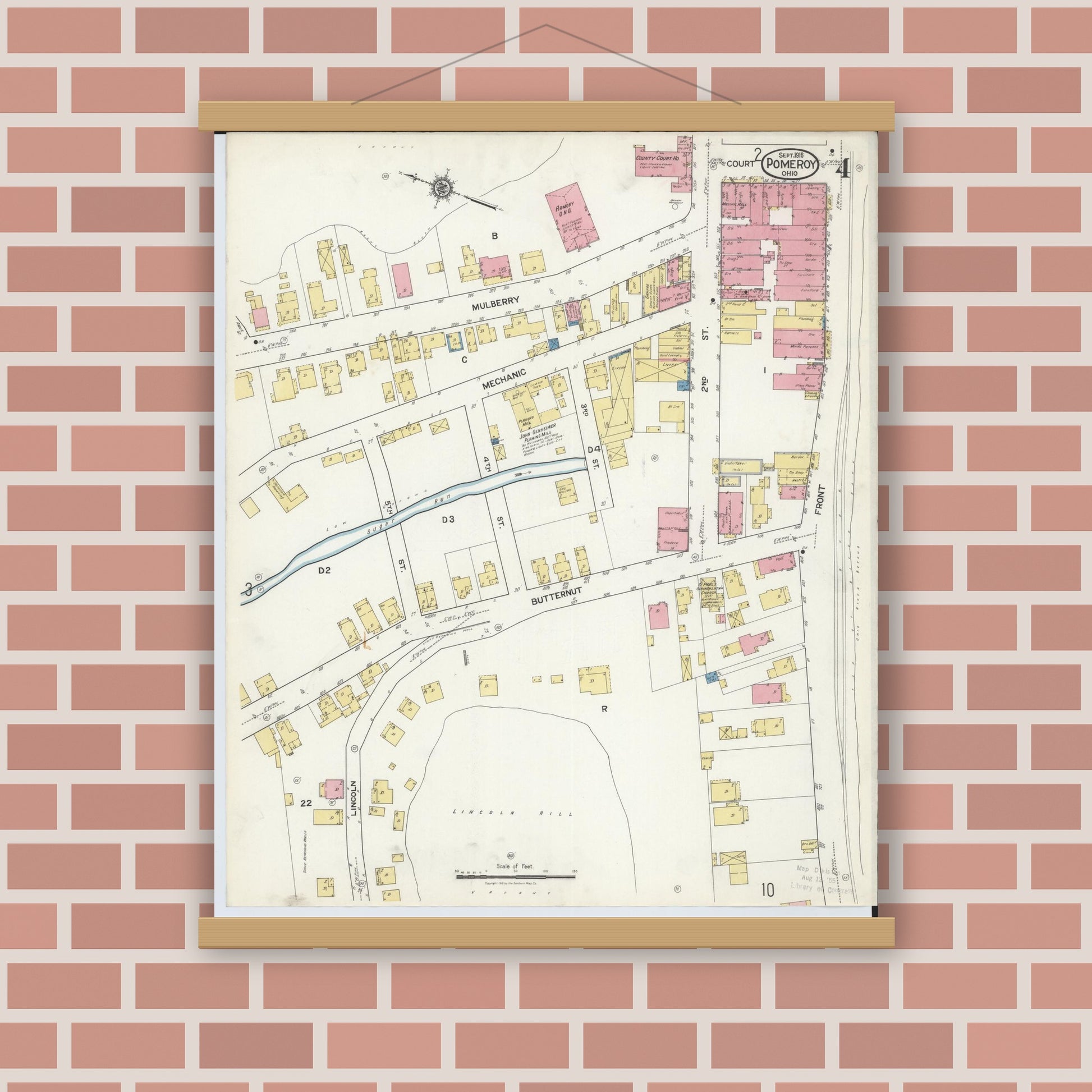 Old map wall art mockup — magnetic wood frame on brick wall — Sanborn Fire Insurance Map from Pomeroy, Meigs County, Ohio (1916), Sheet #0004