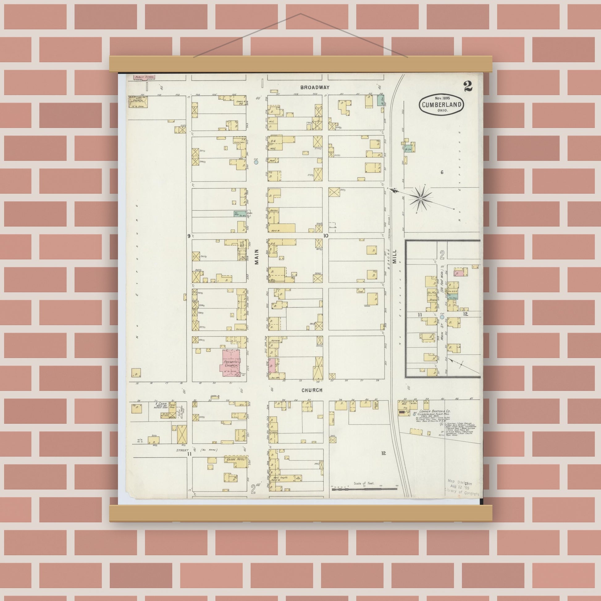 Old map wall art mockup — magnetic wood frame on brick wall — Sanborn Fire Insurance Map from Cumberland, Guernsey County, Ohio (1895), Sheet #0002