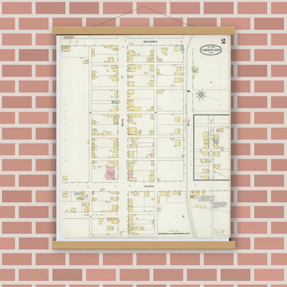 Old map wall art mockup — magnetic wood frame on brick wall — Sanborn Fire Insurance Map from Cumberland, Guernsey County, Ohio (1895), Sheet #0002