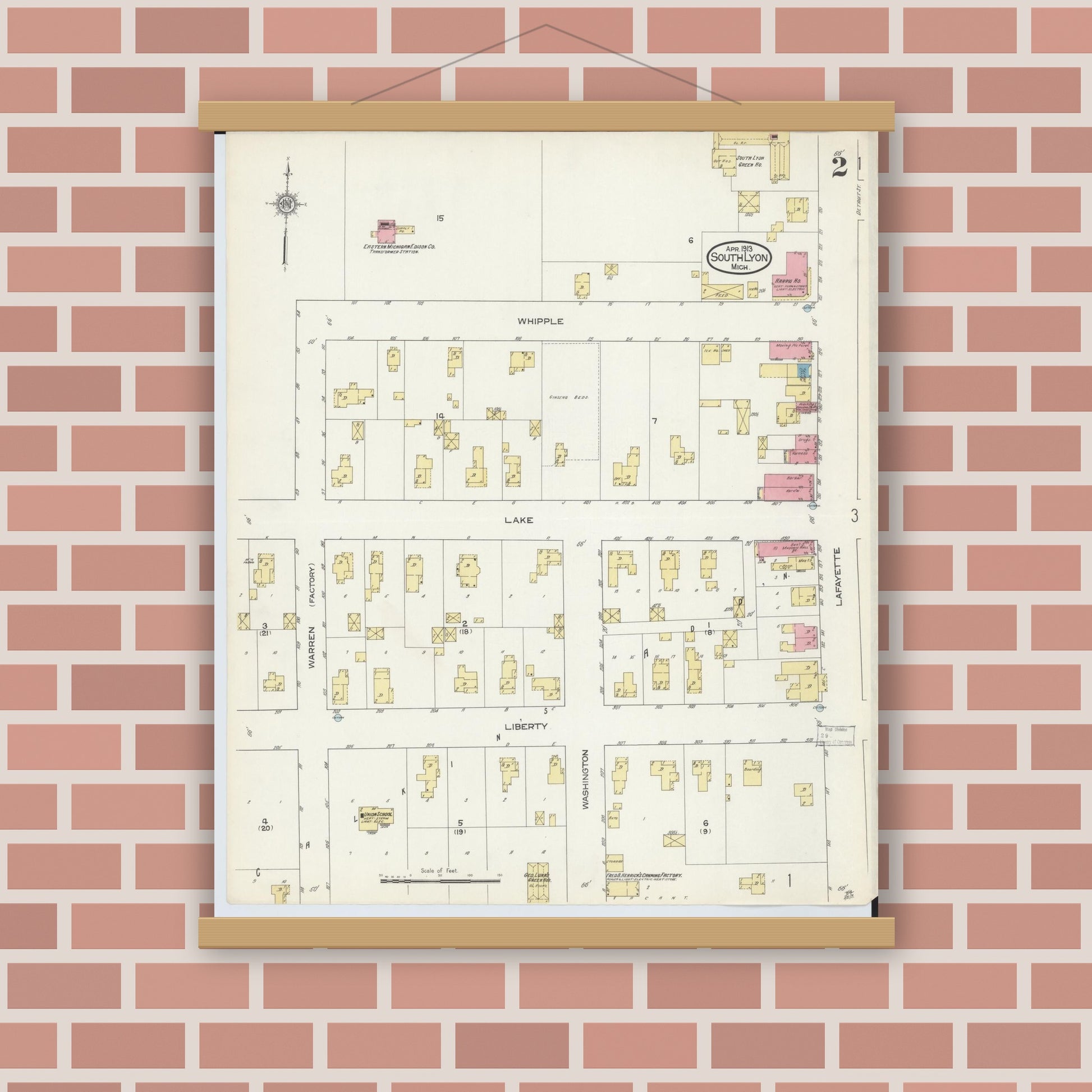 Old map wall art mockup — magnetic wood frame on brick wall — Sanborn Fire Insurance Map from South Lyon, Oakland County, Michigan (1913), Sheet #0002