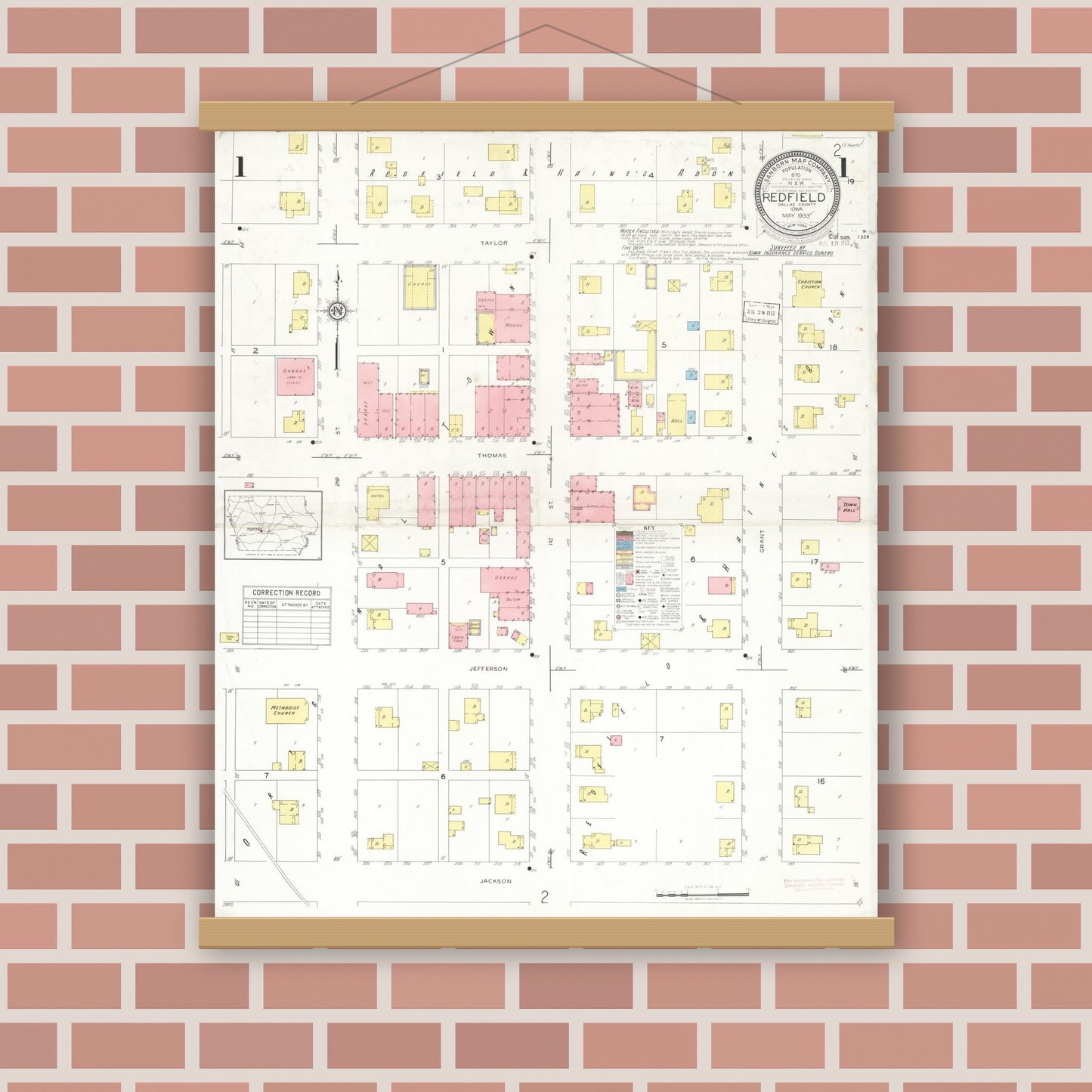 Old map wall art mockup — magnetic wood frame on brick wall — Sanborn Fire Insurance Map from Redfield, Dallas County, Iowa (1933), Sheet #0001