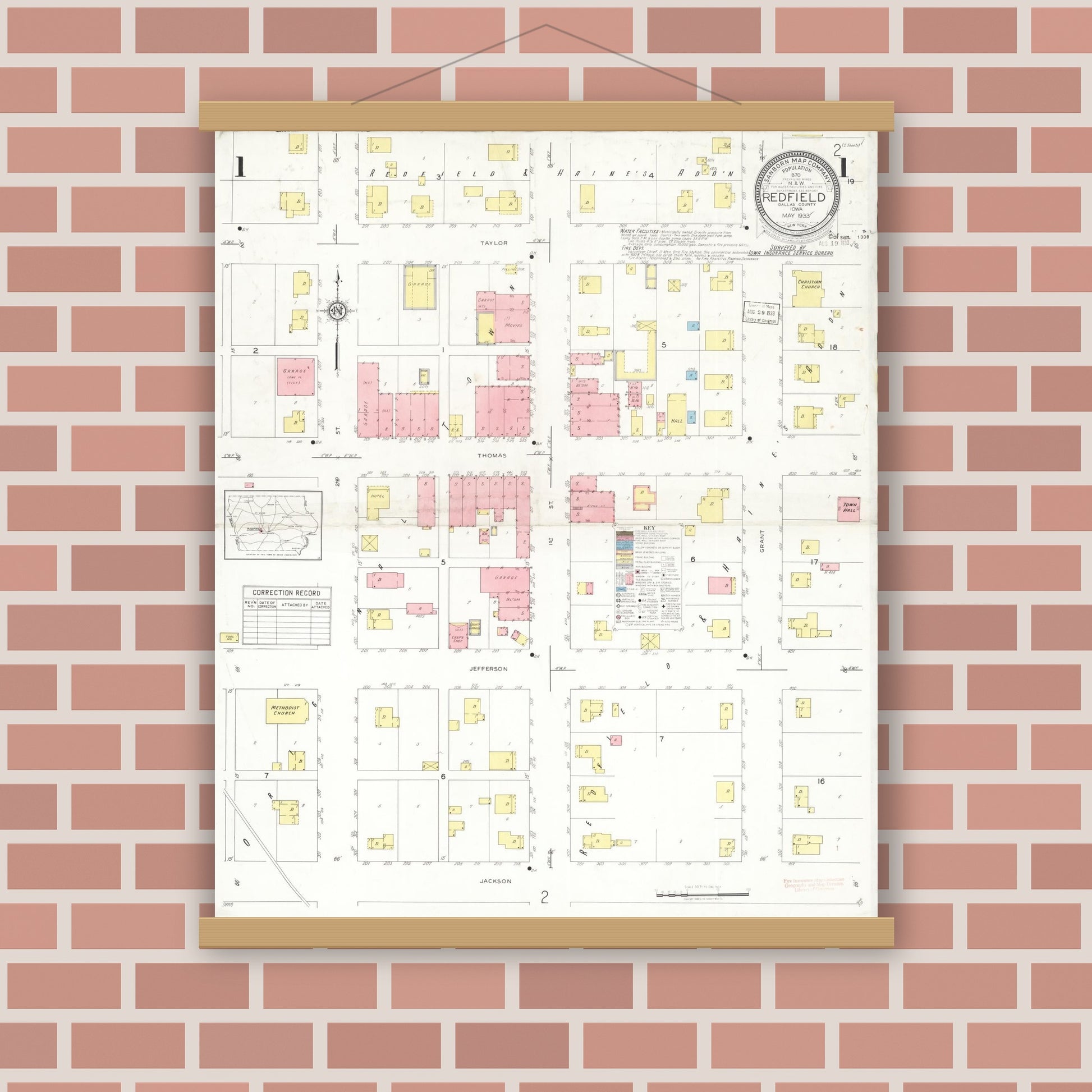 Old map wall art mockup — magnetic wood frame on brick wall — Sanborn Fire Insurance Map from Redfield, Dallas County, Iowa (1933), Sheet #0001