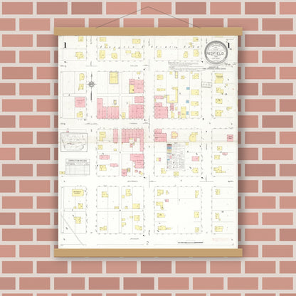 Old map wall art mockup — magnetic wood frame on brick wall — Sanborn Fire Insurance Map from Redfield, Dallas County, Iowa (1933), Sheet #0001