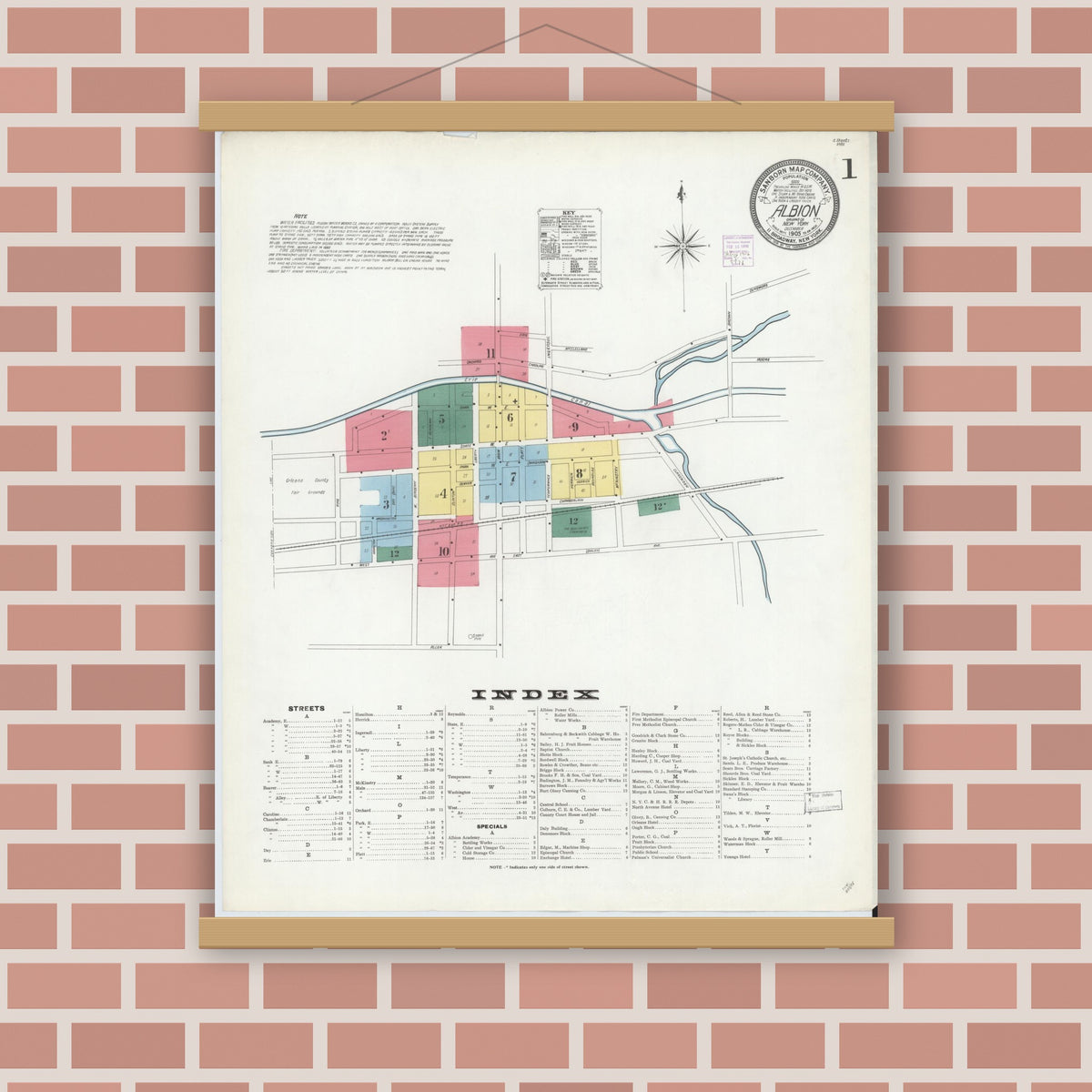 Old map wall art mockup — magnetic wood frame on brick wall — Sanborn Fire Insurance Map from Albion, Orleans County, New York (1905) - Complete Map Set