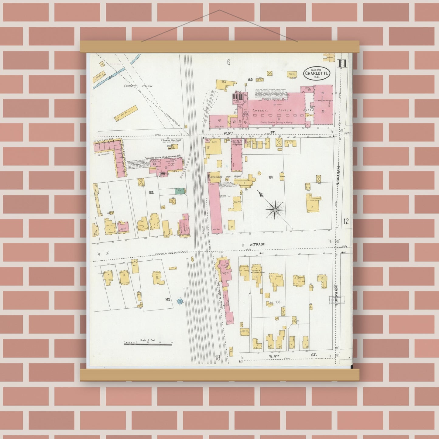 Old map wall art mockup — magnetic wood frame on brick wall — Sanborn Fire Insurance Map from Charlotte, Mecklenburg County, North Carolina (1905), Sheet #0011