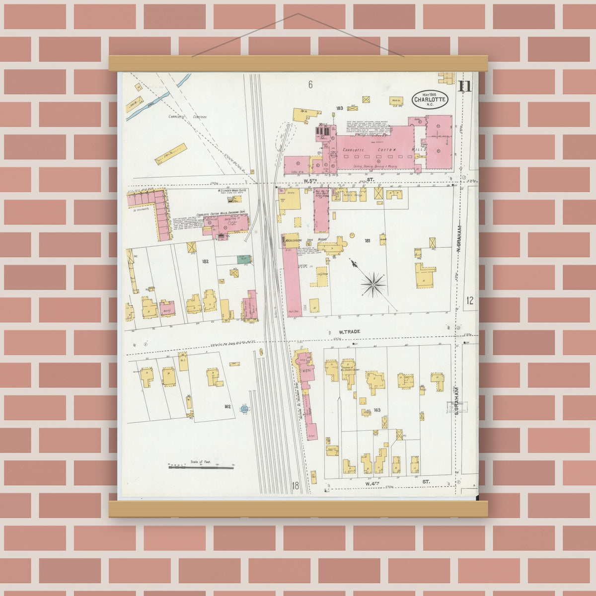 Old map wall art mockup — magnetic wood frame on brick wall — Sanborn Fire Insurance Map from Charlotte, Mecklenburg County, North Carolina (1905), Sheet #0011
