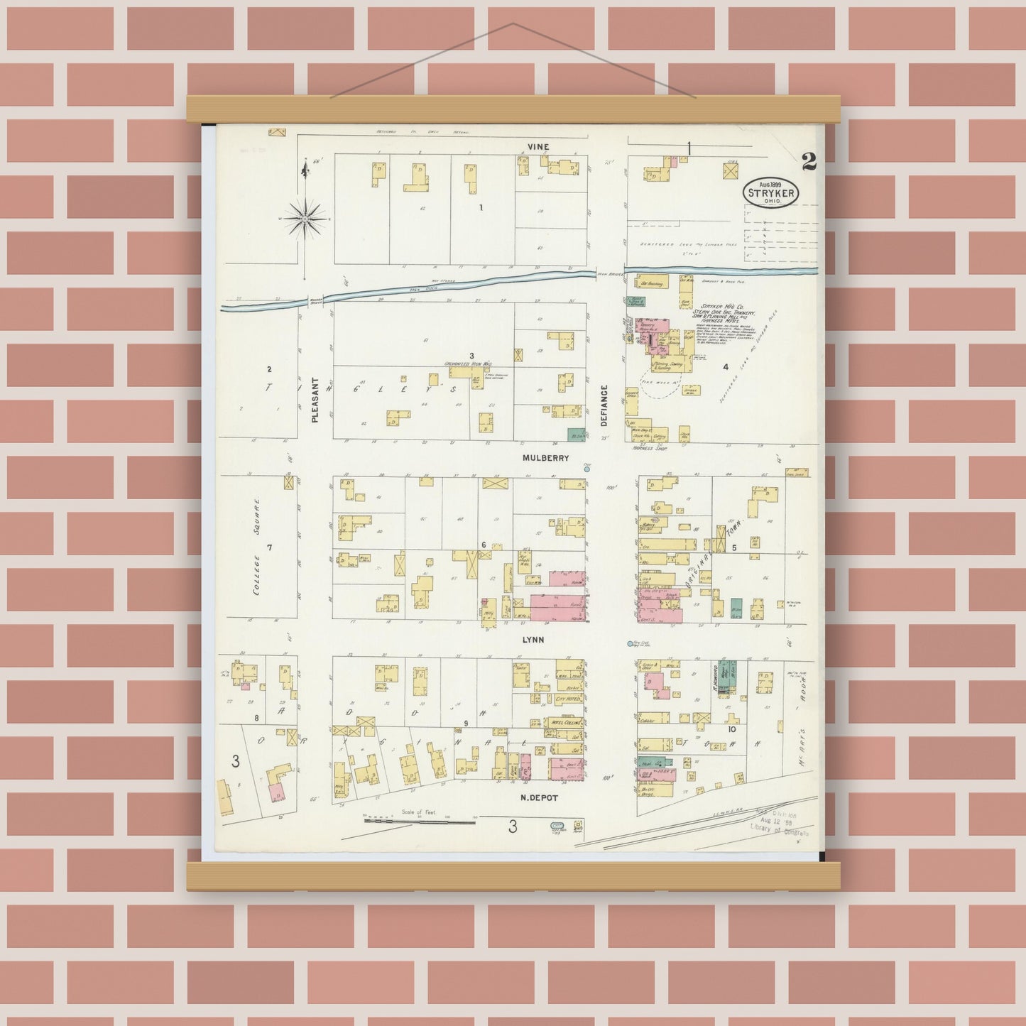 Old map wall art mockup — magnetic wood frame on brick wall — Sanborn Fire Insurance Map from Stryker, Williams County, Ohio (1899), Sheet #0002