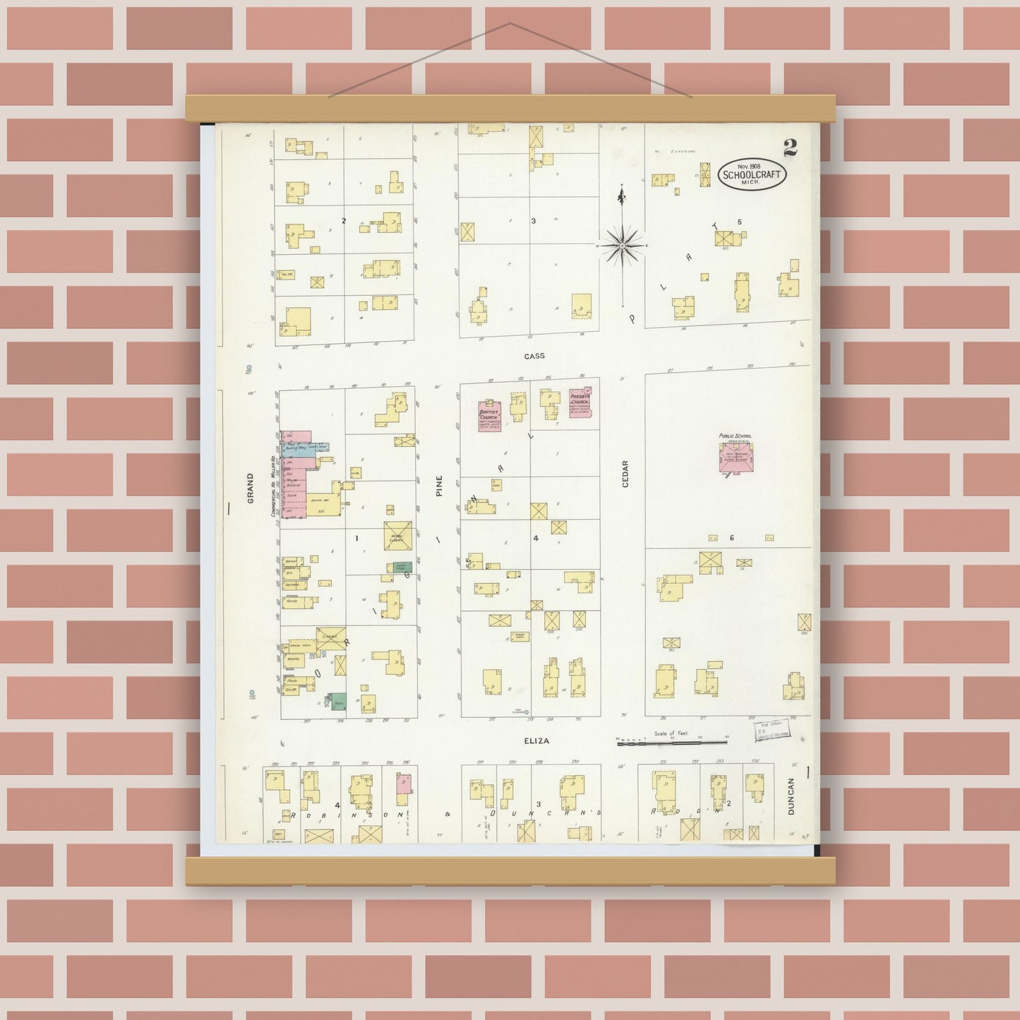 Old map wall art mockup — magnetic wood frame on brick wall — Sanborn Fire Insurance Map from Schoolcraft, Kalamazoo County, Michigan (1908), Sheet #0002