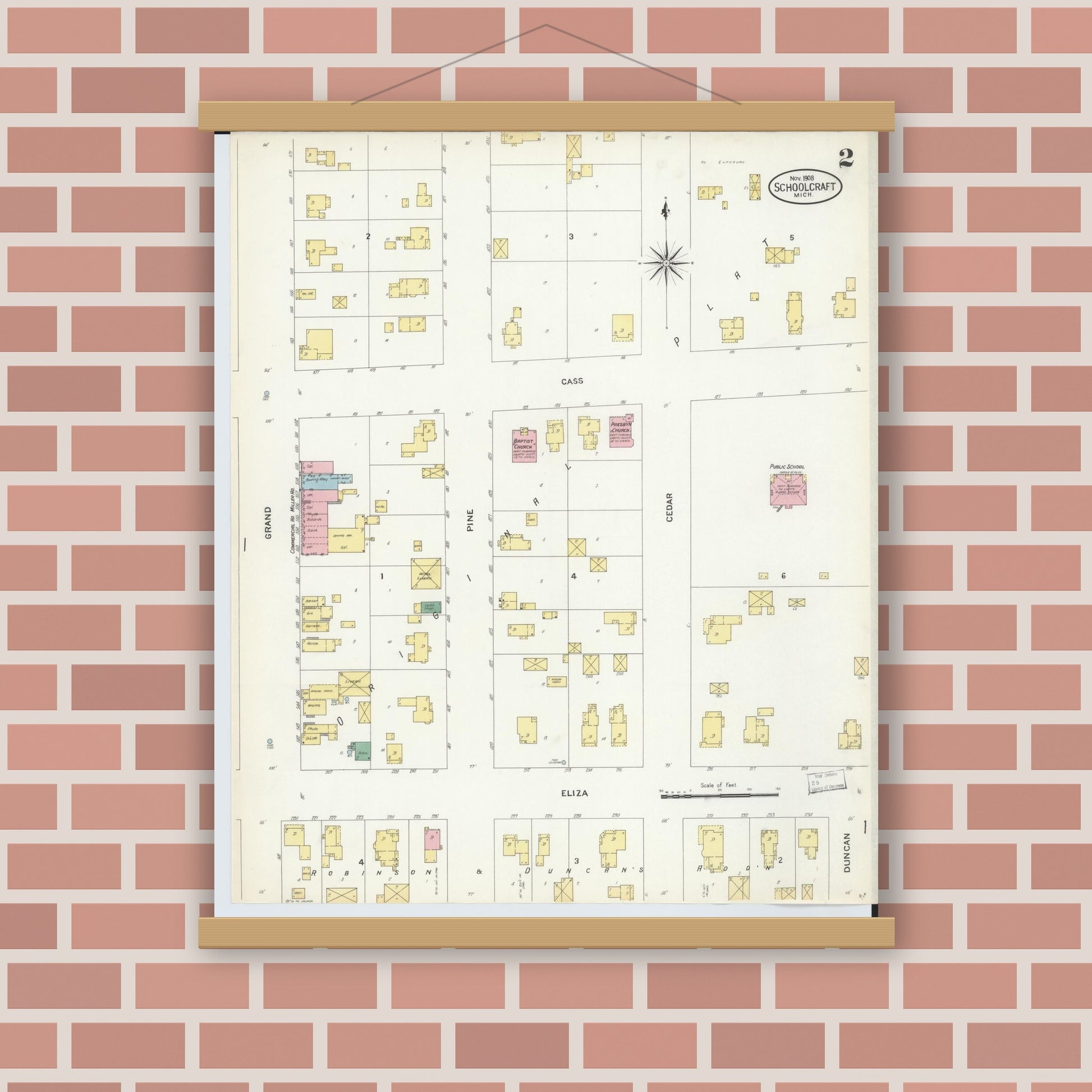 Old map wall art mockup — magnetic wood frame on brick wall — Sanborn Fire Insurance Map from Schoolcraft, Kalamazoo County, Michigan (1908), Sheet #0002