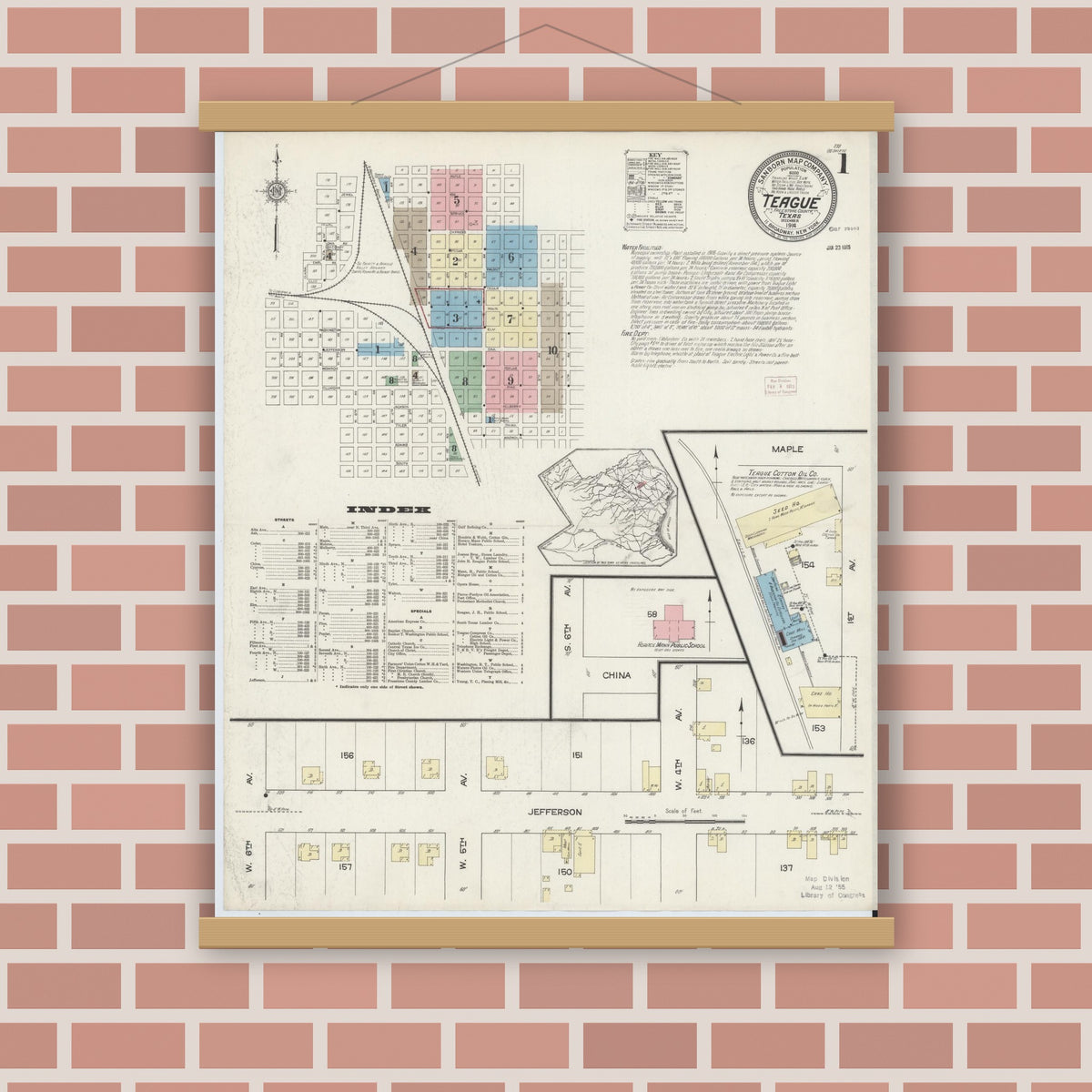 Old map wall art mockup — magnetic wood frame on brick wall — Sanborn Fire Insurance Map from Teague, Freestone County, Texas (1914), Sheet #0001