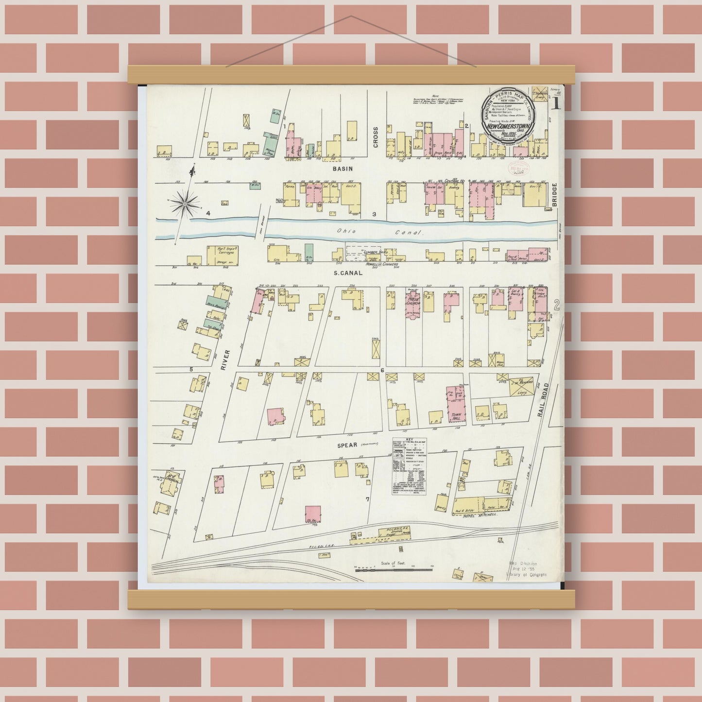 Old map wall art mockup — magnetic wood frame on brick wall — Sanborn Fire Insurance Map from Newcomerstown, Tuscarawas County, Ohio (1895) - Complete Map Set