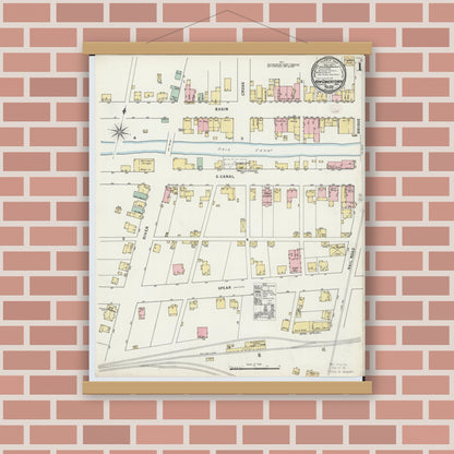 Old map wall art mockup — magnetic wood frame on brick wall — Sanborn Fire Insurance Map from Newcomerstown, Tuscarawas County, Ohio (1895) - Complete Map Set