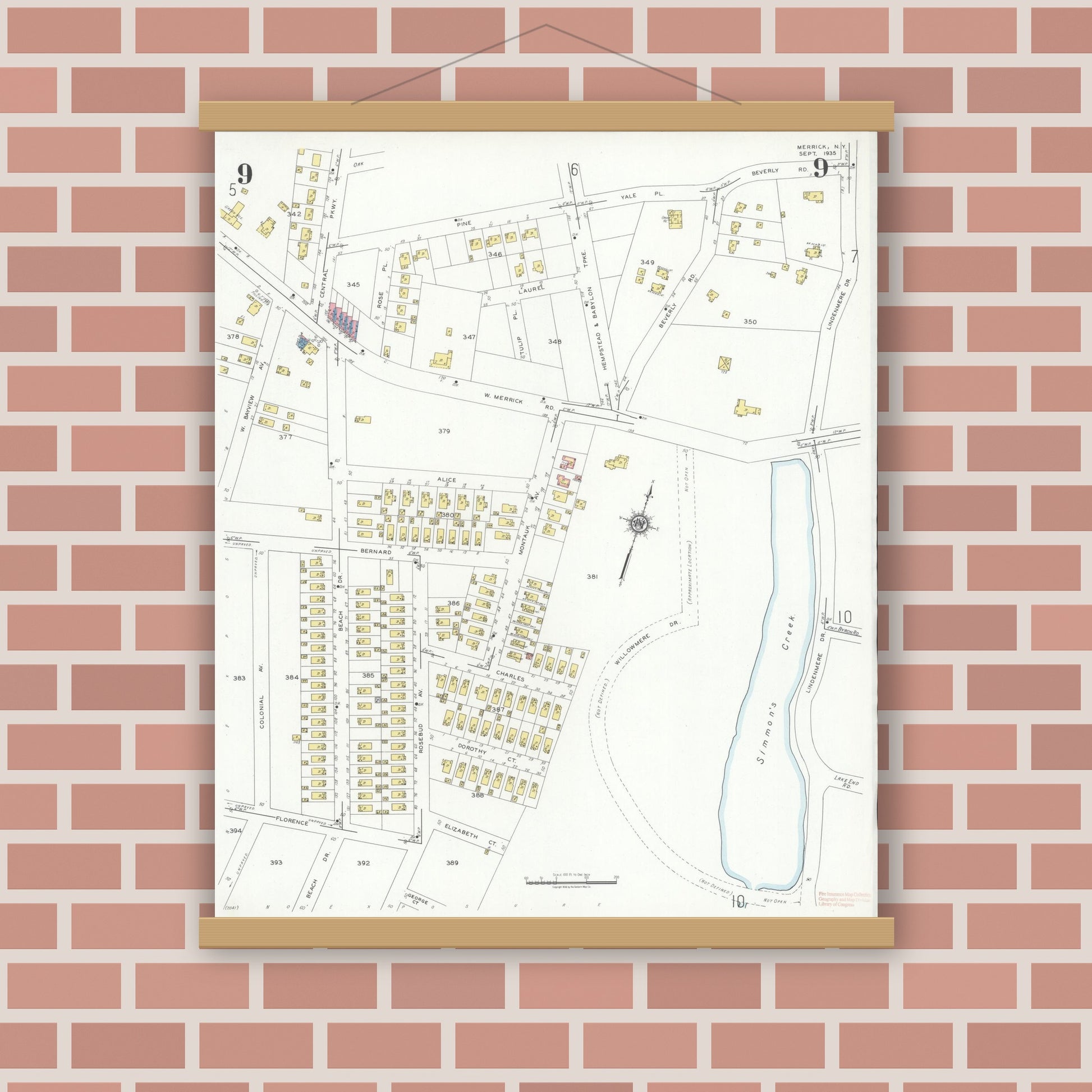 Old map wall art mockup — magnetic wood frame on brick wall — Sanborn Fire Insurance Map from Merrick, Nassau County, New York (1935), Sheet #0009