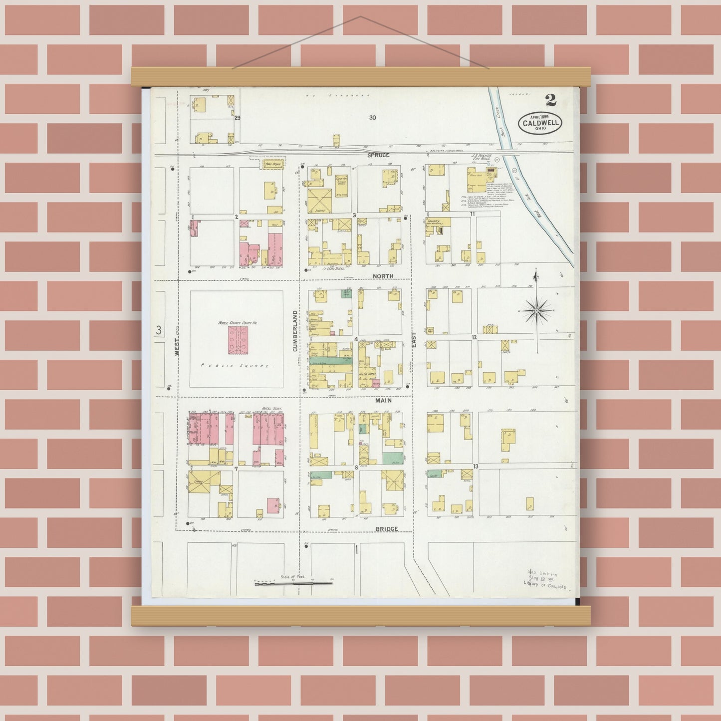 Old map wall art mockup — magnetic wood frame on brick wall — Sanborn Fire Insurance Map from Caldwell, Noble County, Ohio (1899), Sheet #0002
