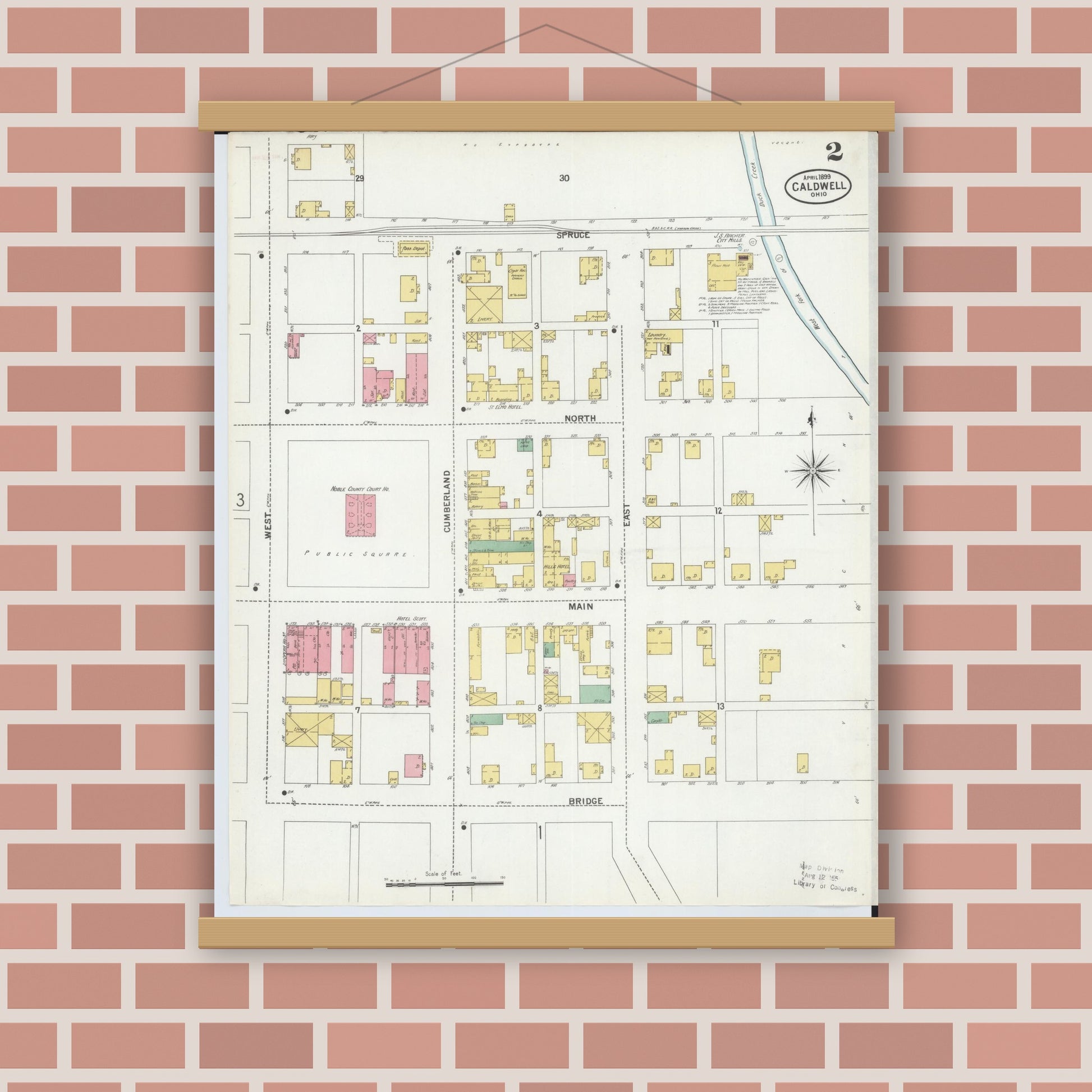 Old map wall art mockup — magnetic wood frame on brick wall — Sanborn Fire Insurance Map from Caldwell, Noble County, Ohio (1899), Sheet #0002