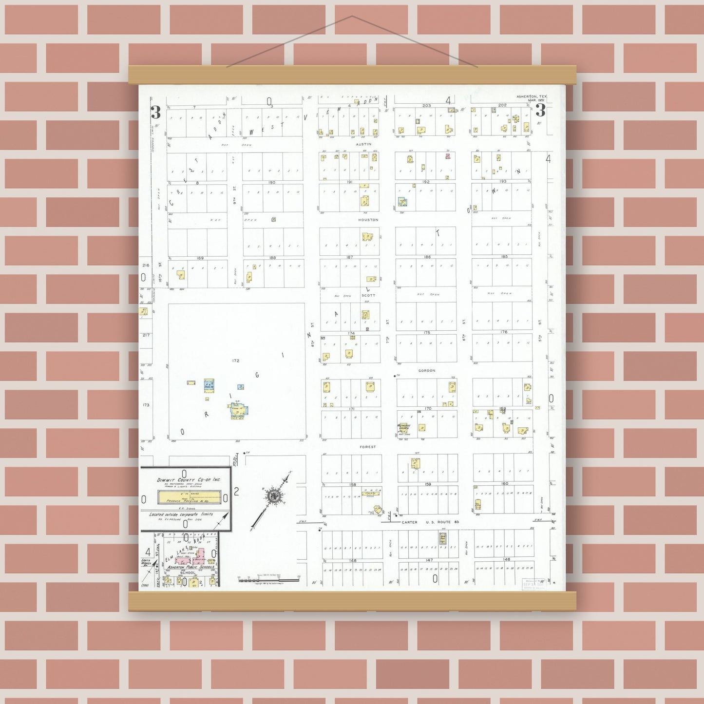 Old map wall art mockup — magnetic wood frame on brick wall — Sanborn Fire Insurance Map from Asherton, Dimmit County, Texas (1951), Sheet #0003