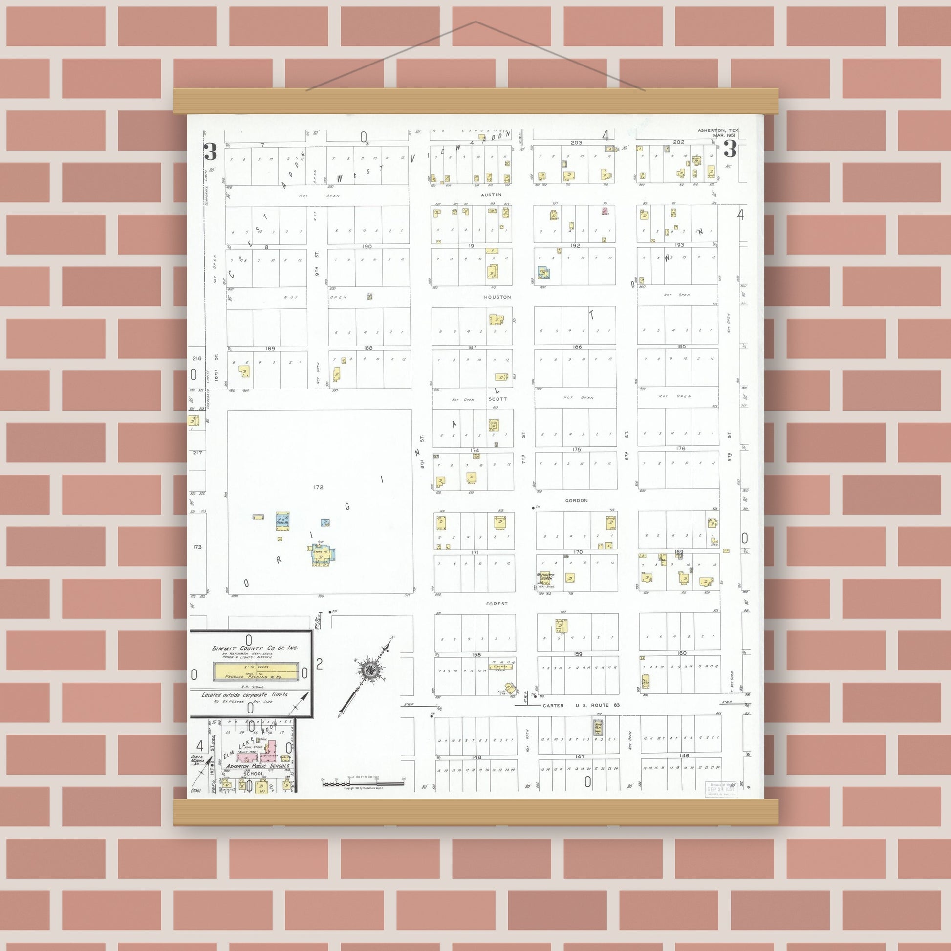Old map wall art mockup — magnetic wood frame on brick wall — Sanborn Fire Insurance Map from Asherton, Dimmit County, Texas (1951), Sheet #0003