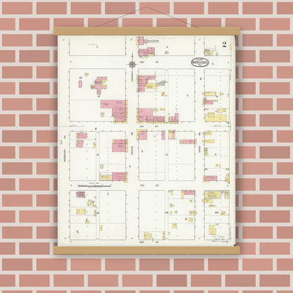 Old map wall art mockup — magnetic wood frame on brick wall — Sanborn Fire Insurance Map from Mercedes, Hidalgo County, Texas (1917), Sheet #0002