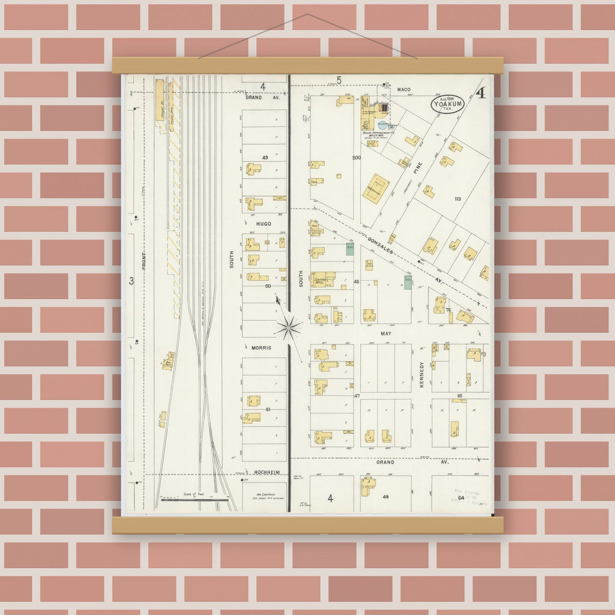 Old map wall art mockup — magnetic wood frame on brick wall — Sanborn Fire Insurance Map from Yoakum, De Witt And Lavaca Counties, Texas (1898), Sheet #0004