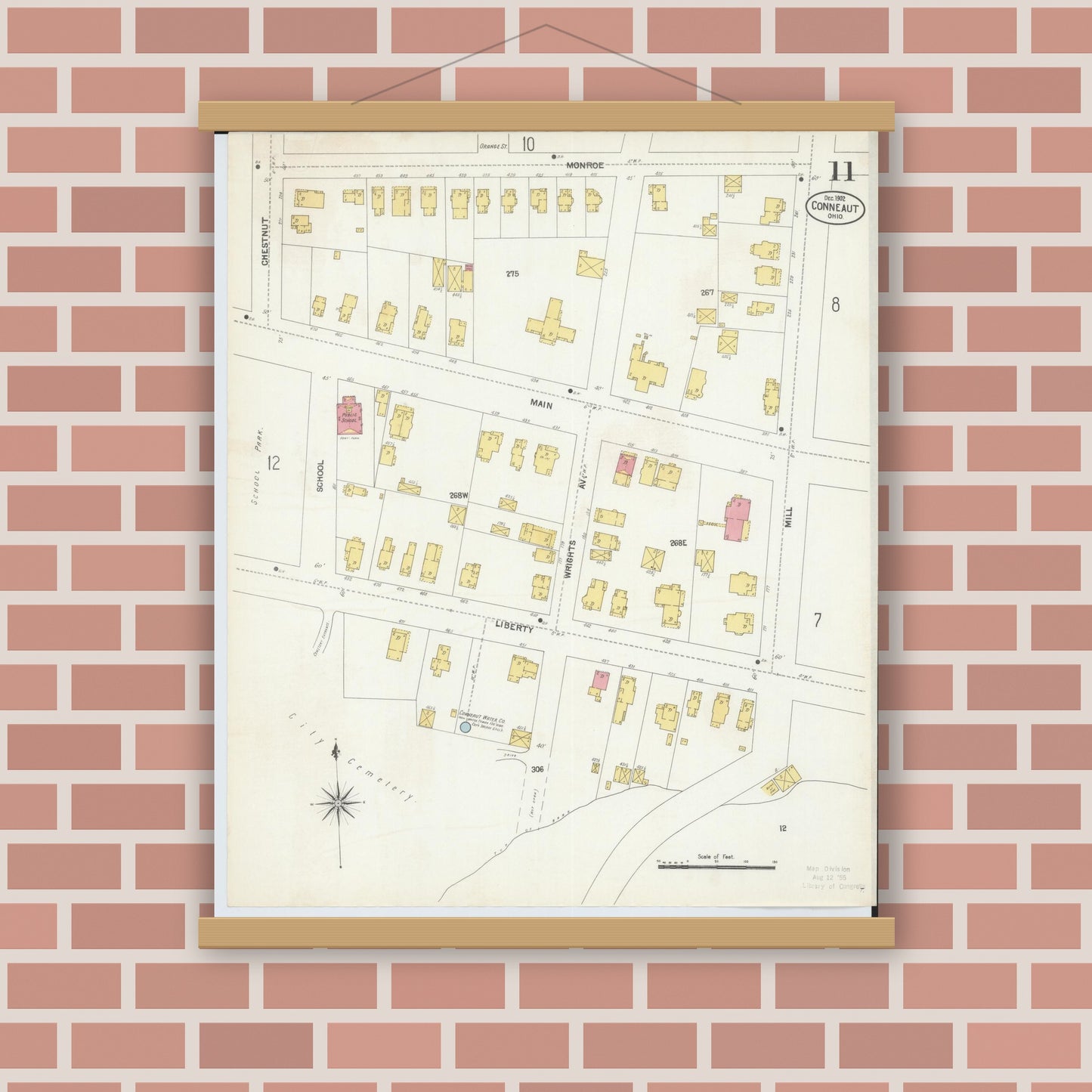 Old map wall art mockup — magnetic wood frame on brick wall — Sanborn Fire Insurance Map from Conneaut, Ashtabula County, Ohio (1902), Sheet #0011