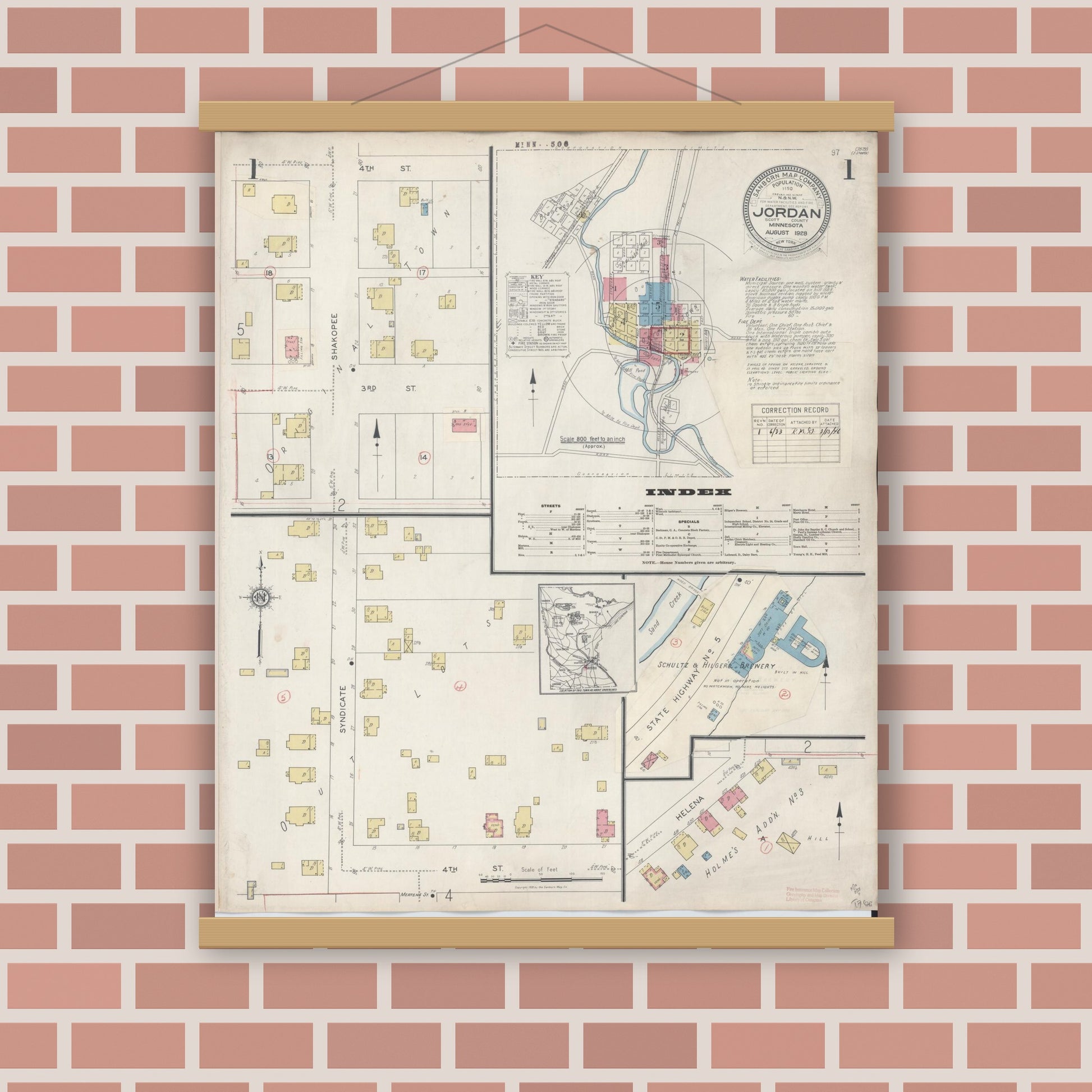 Old map wall art mockup — magnetic wood frame on brick wall — Sanborn Fire Insurance Map from Jordan, Scott County, Minnesota (1933), Sheet #0001
