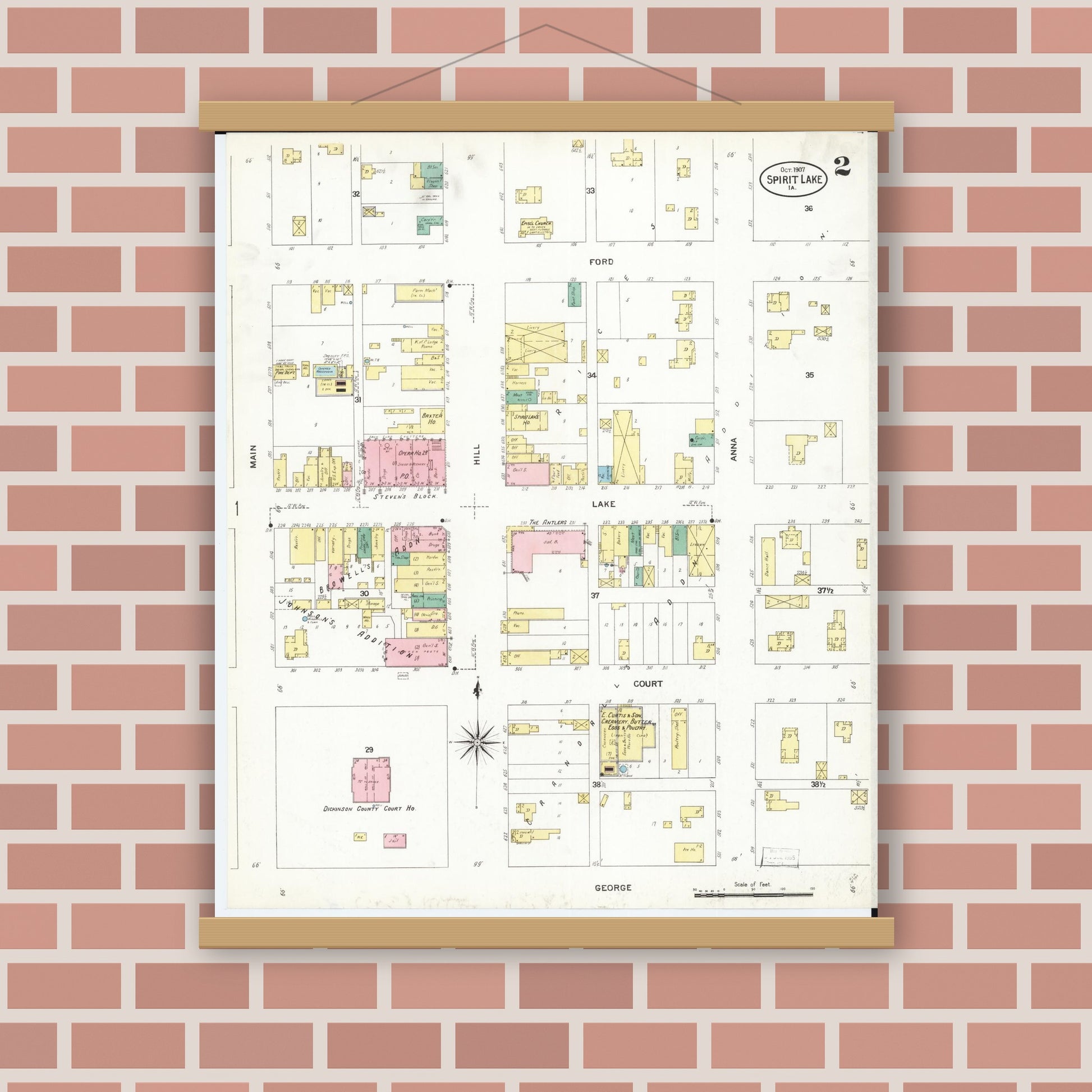 Old map wall art mockup — magnetic wood frame on brick wall — Sanborn Fire Insurance Map from Spirit Lake, Dickinson County, Iowa (1907), Sheet #0002