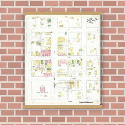 Old map wall art mockup — magnetic wood frame on brick wall — Sanborn Fire Insurance Map from Spirit Lake, Dickinson County, Iowa (1907), Sheet #0002