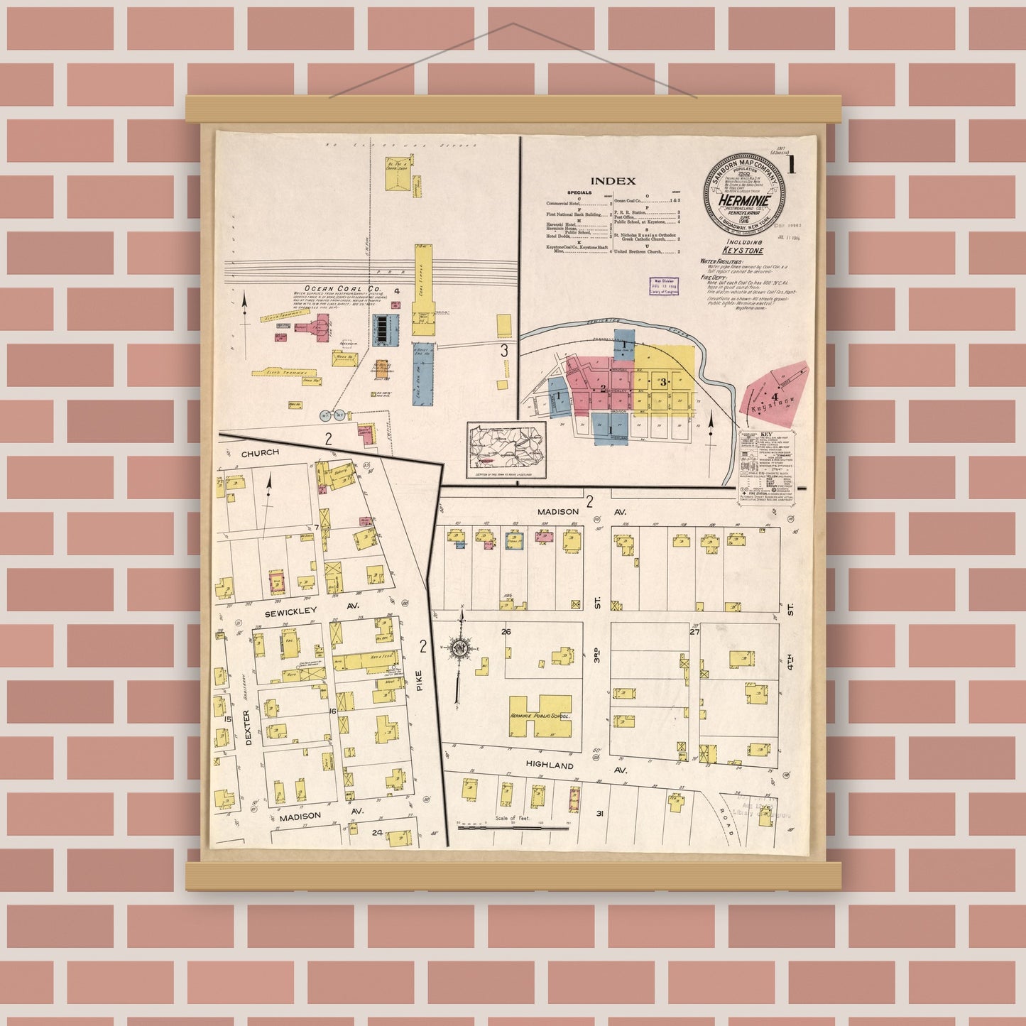 Old map wall art mockup — magnetic wood frame on brick wall — Sanborn Fire Insurance Map from Herminie, Westmoreland County, Pennsylvania (1916), Sheet #0001