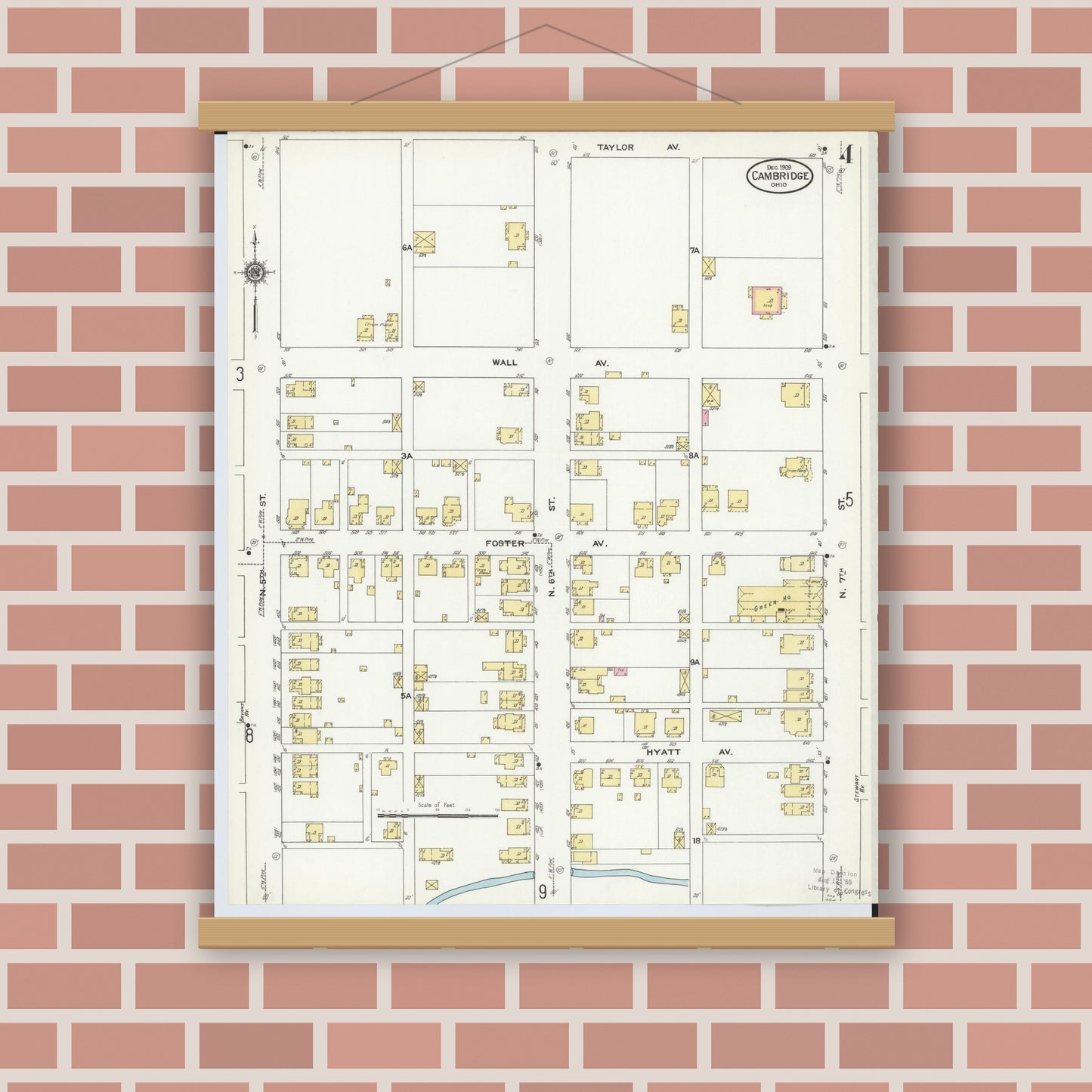 Old map wall art mockup — magnetic wood frame on brick wall — Sanborn Fire Insurance Map from Cambridge, Guernsey County, Ohio (1909), Sheet #0004