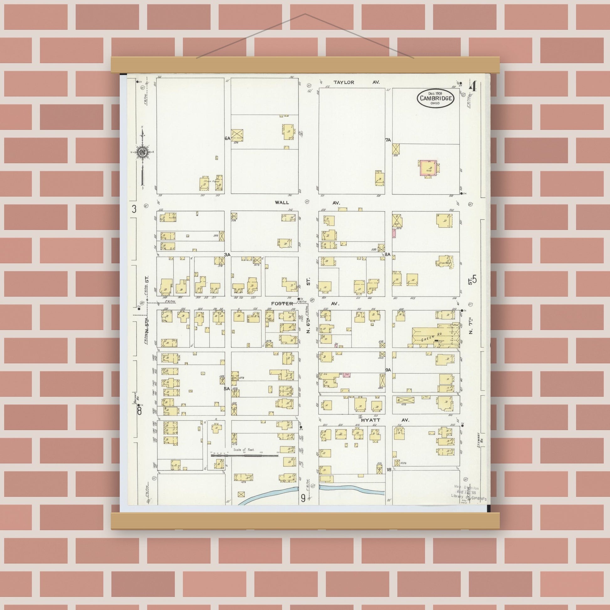Old map wall art mockup — magnetic wood frame on brick wall — Sanborn Fire Insurance Map from Cambridge, Guernsey County, Ohio (1909), Sheet #0004