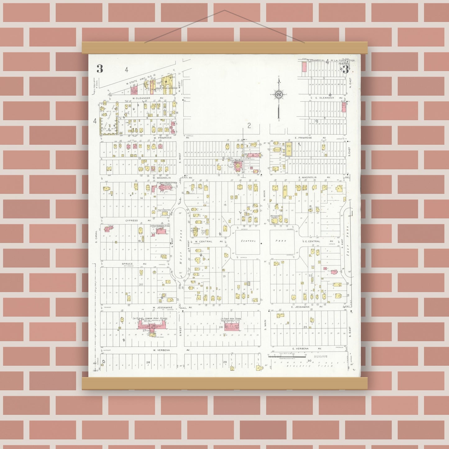 Old map wall art mockup — magnetic wood frame on brick wall — Sanborn Fire Insurance Map from La Feria, Cameron County, Texas (1936), Sheet #0003