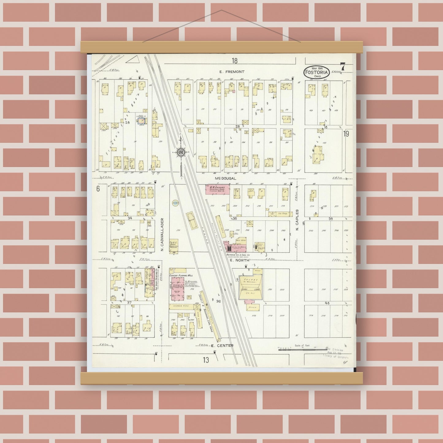 Old map wall art mockup — magnetic wood frame on brick wall — Sanborn Fire Insurance Map from Fostoria, Seneca, Hancock, And Wood Counties, Ohio (1914), Sheet #0007