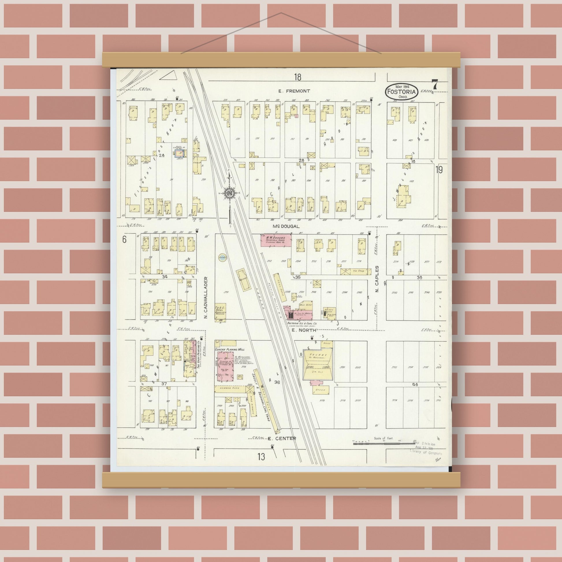 Old map wall art mockup — magnetic wood frame on brick wall — Sanborn Fire Insurance Map from Fostoria, Seneca, Hancock, And Wood Counties, Ohio (1914), Sheet #0007