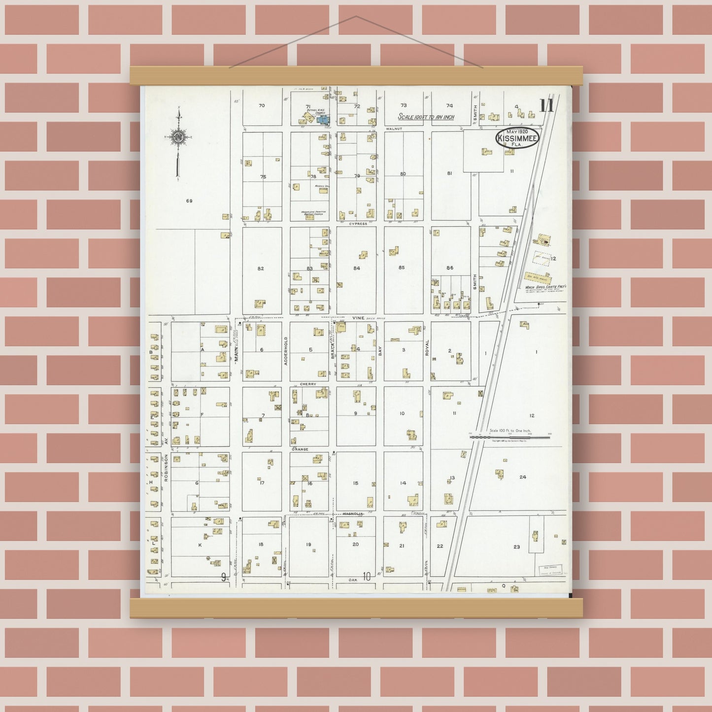 Old map wall art mockup — magnetic wood frame on brick wall — Sanborn Fire Insurance Map from Kissimmee, Osceola County, Florida (1920), Sheet #0011