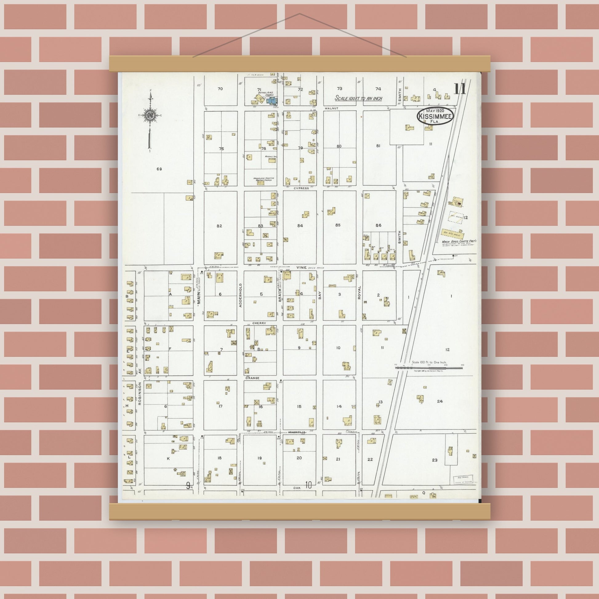 Old map wall art mockup — magnetic wood frame on brick wall — Sanborn Fire Insurance Map from Kissimmee, Osceola County, Florida (1920), Sheet #0011