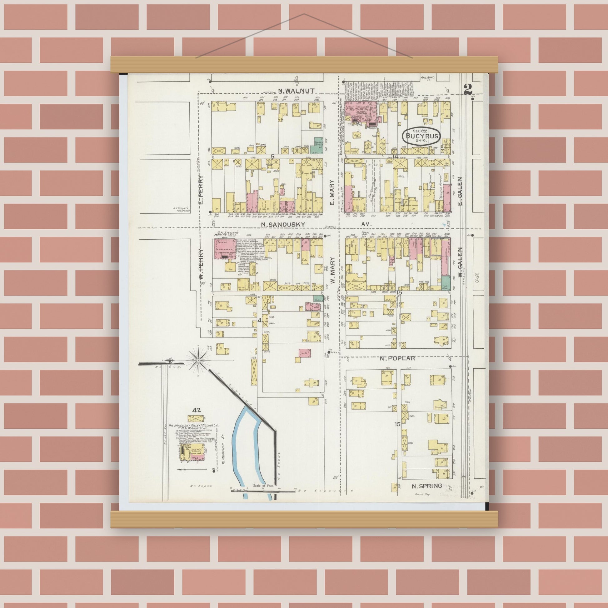 Old map wall art mockup — magnetic wood frame on brick wall — Sanborn Fire Insurance Map from Bucyrus, Crawford County, Ohio (1892), Sheet #0002