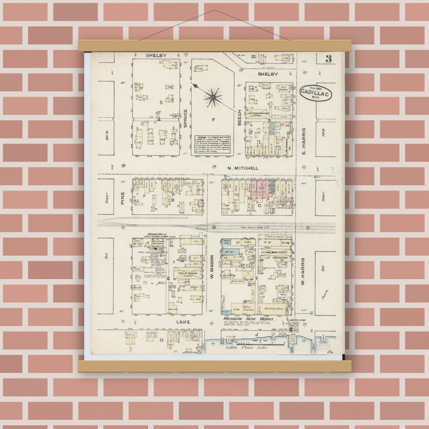Old map wall art mockup — magnetic wood frame on brick wall — Sanborn Fire Insurance Map from Cadillac, Wexford County, Michigan (1884), Sheet #0003