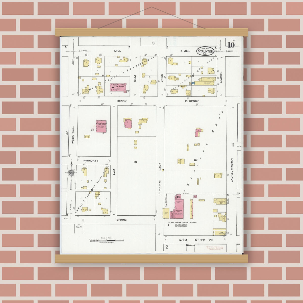 Old map wall art mockup — magnetic wood frame on brick wall — Sanborn Fire Insurance Map from Staunton, Macoupin County, Illinois (1921), Sheet #0010