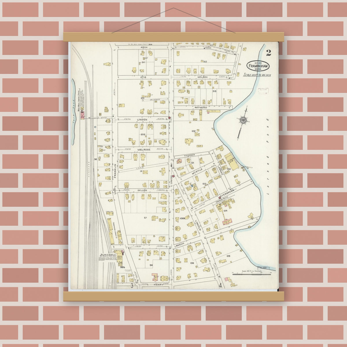 Old map wall art mockup — magnetic wood frame on brick wall — Sanborn Fire Insurance Map from Framingham, Middlesex County, Massachusetts (1915), Sheet #0002