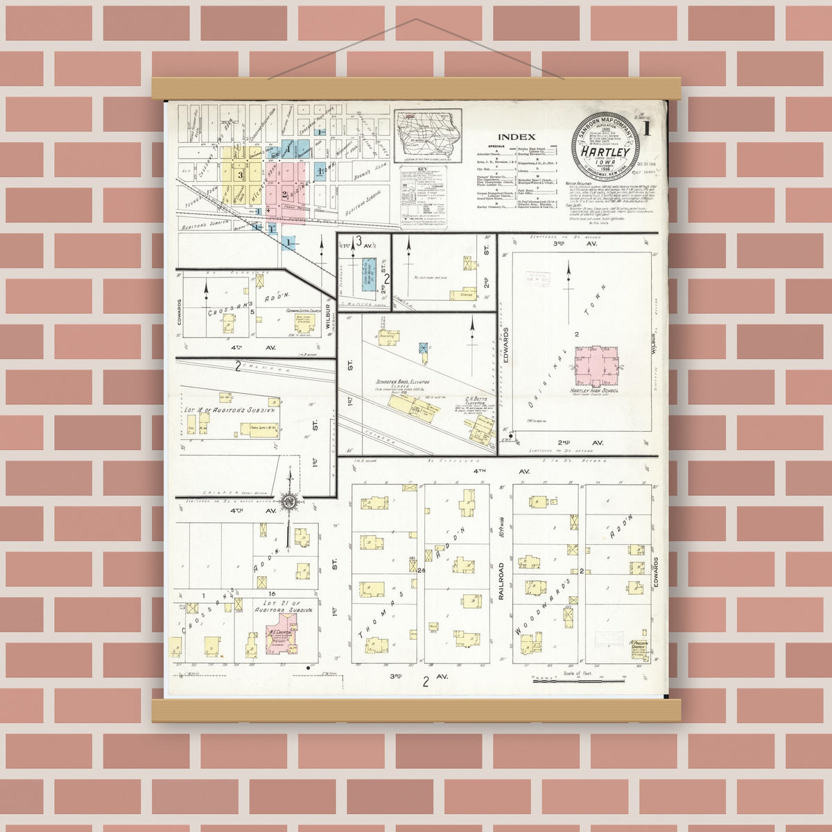 Old map wall art mockup — magnetic wood frame on brick wall — Sanborn Fire Insurance Map from Hartley, O'Brien County, Iowa (1914), Sheet #0001