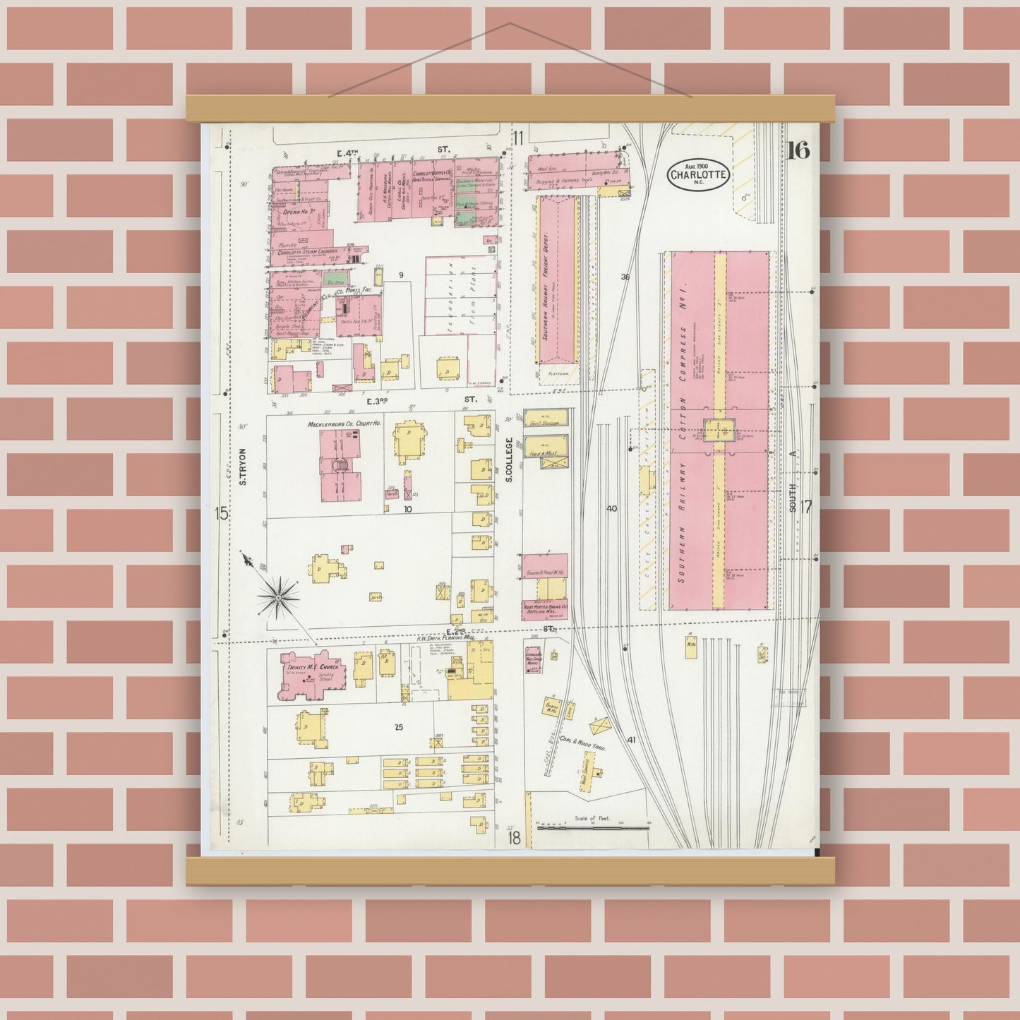 Old map wall art mockup — magnetic wood frame on brick wall — Sanborn Fire Insurance Map from Charlotte, Mecklenburg County, North Carolina (1900), Sheet #0016