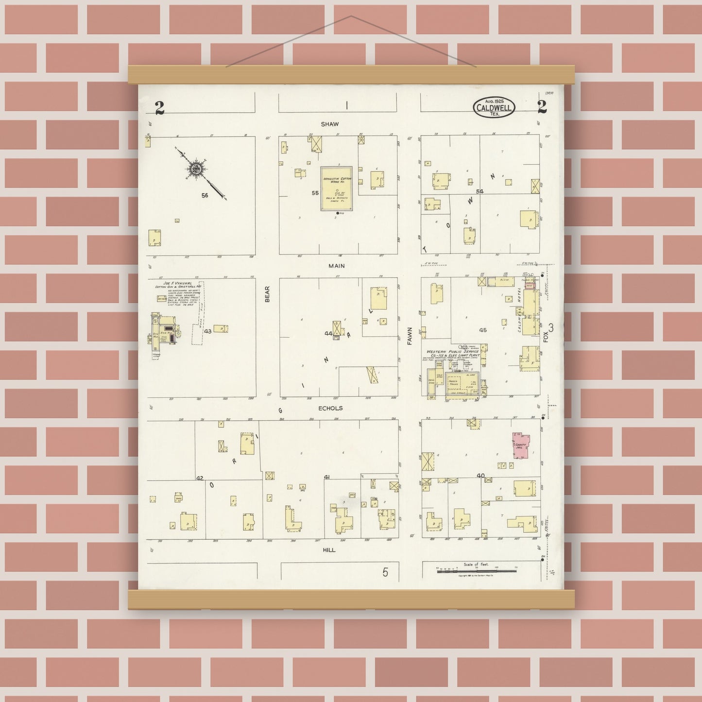 Old map wall art mockup — magnetic wood frame on brick wall — Sanborn Fire Insurance Map from Caldwell, Burleson County, Texas (1925), Sheet #0002
